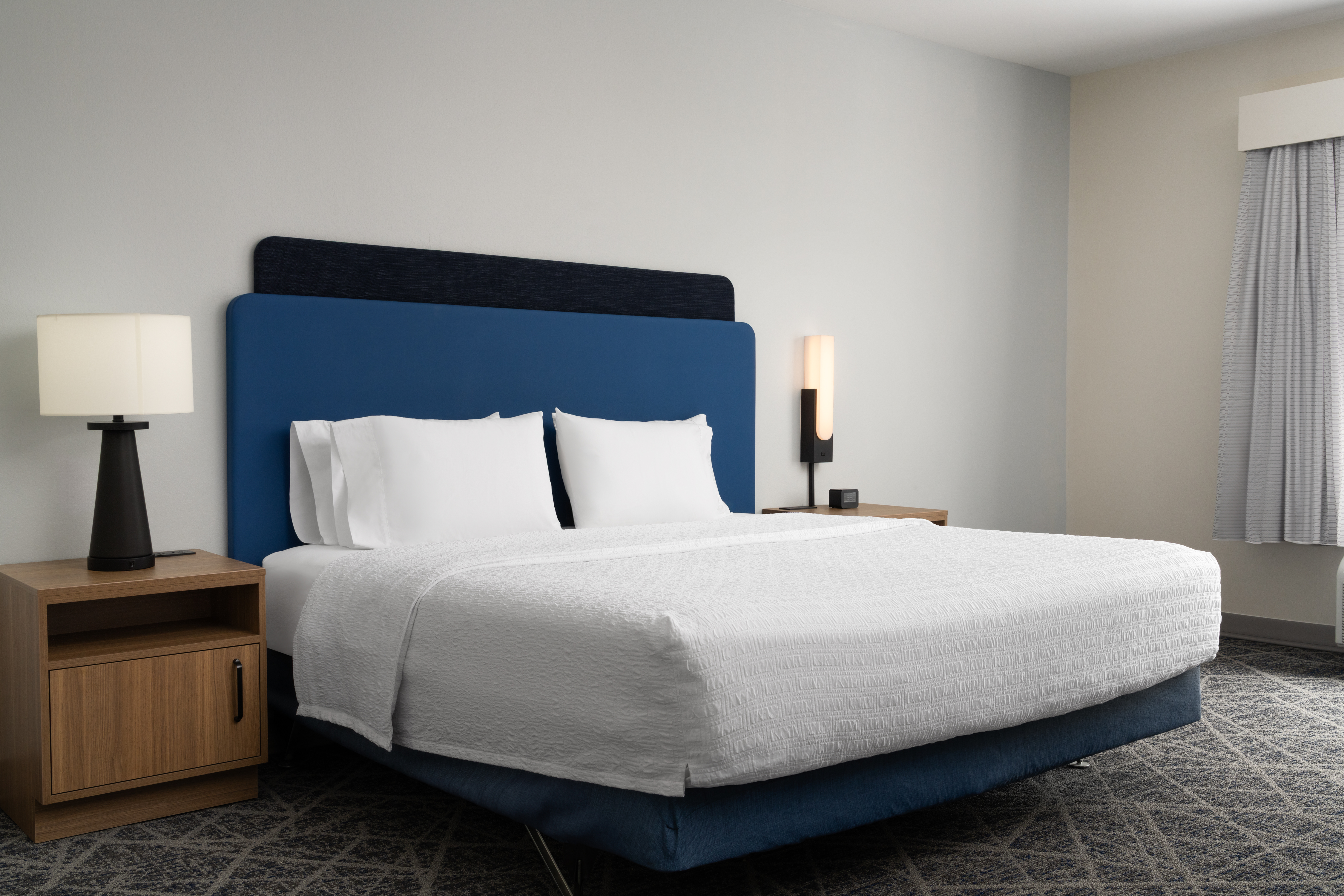 Accessible Bedroom with King Size Bed, Lamps, and Bedside Tables