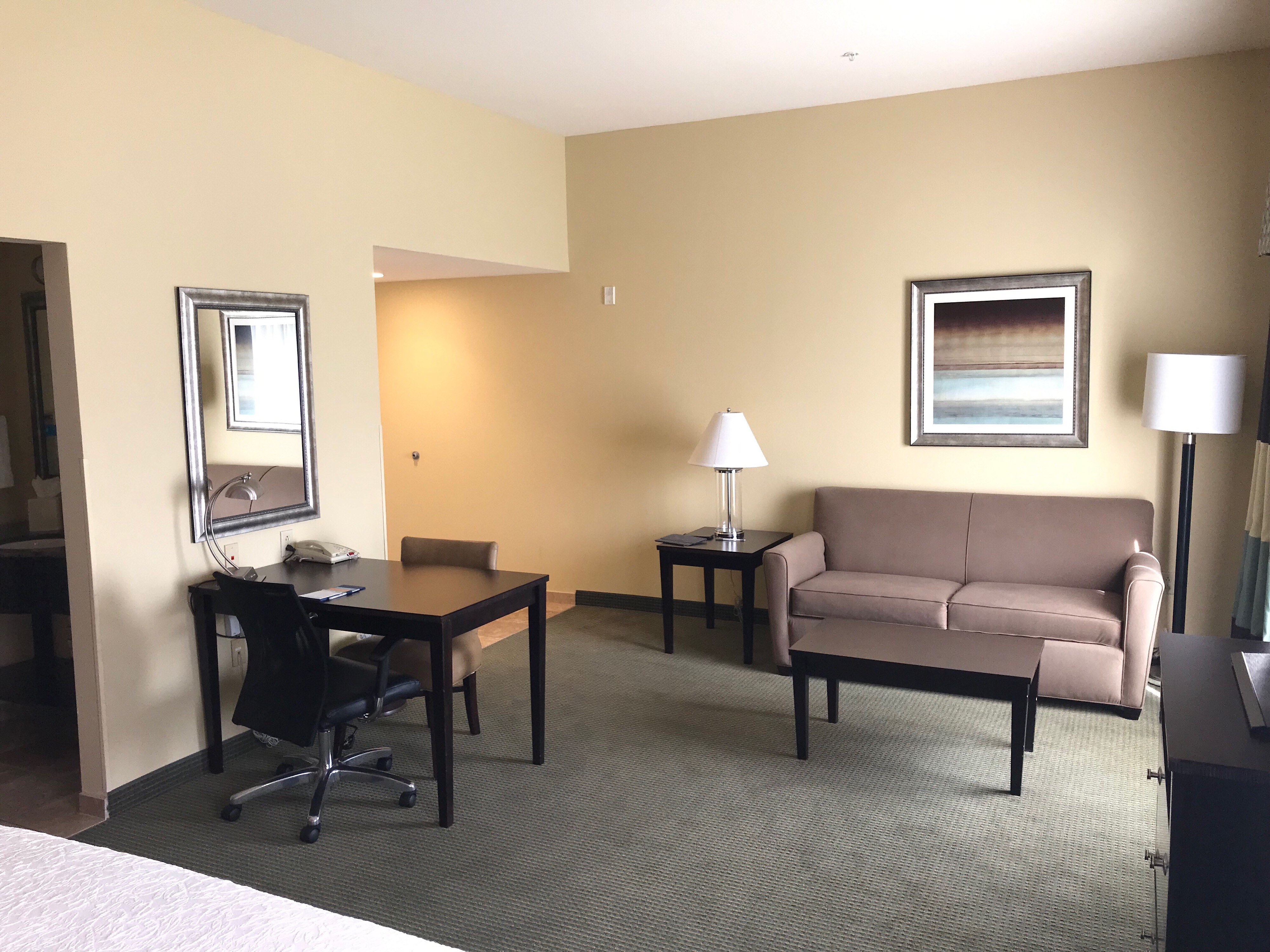 Suite Living Room with Couch and Work Desk