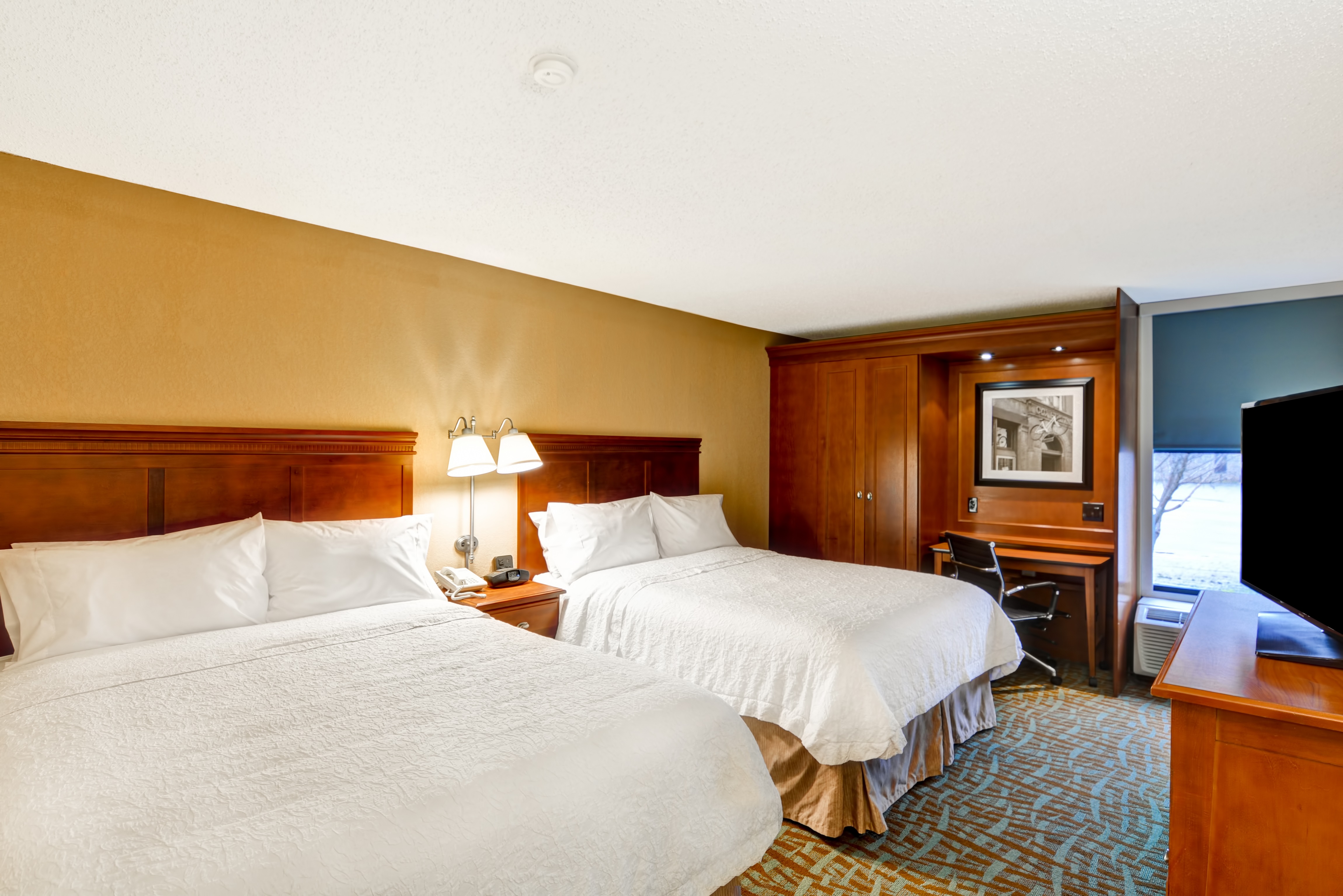 Guestroom with Two Queen Beds, Work Desk, Outside View and Television