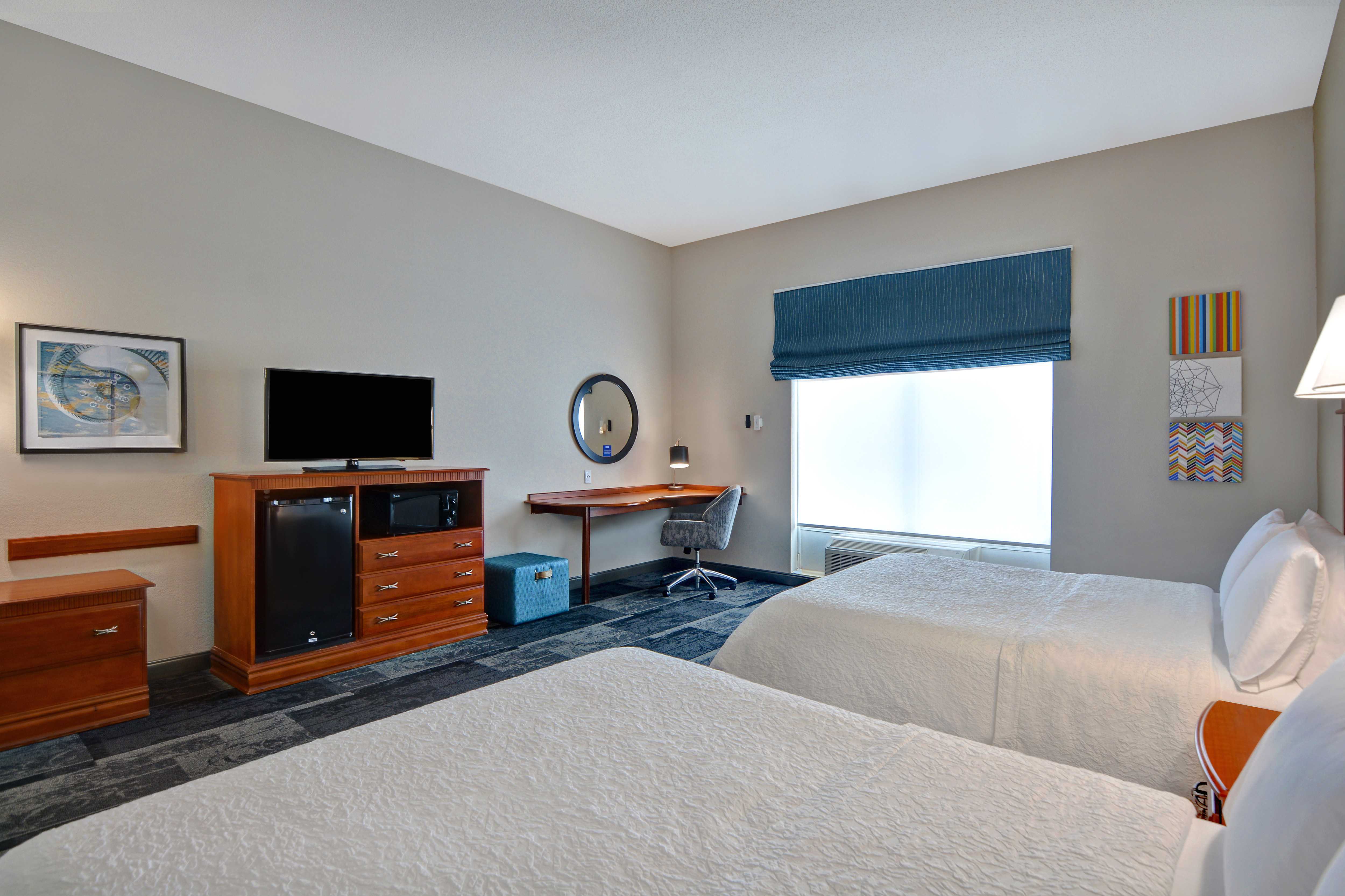 Two Beds Desk HDTV Microwave and Minifridge in Guest Room