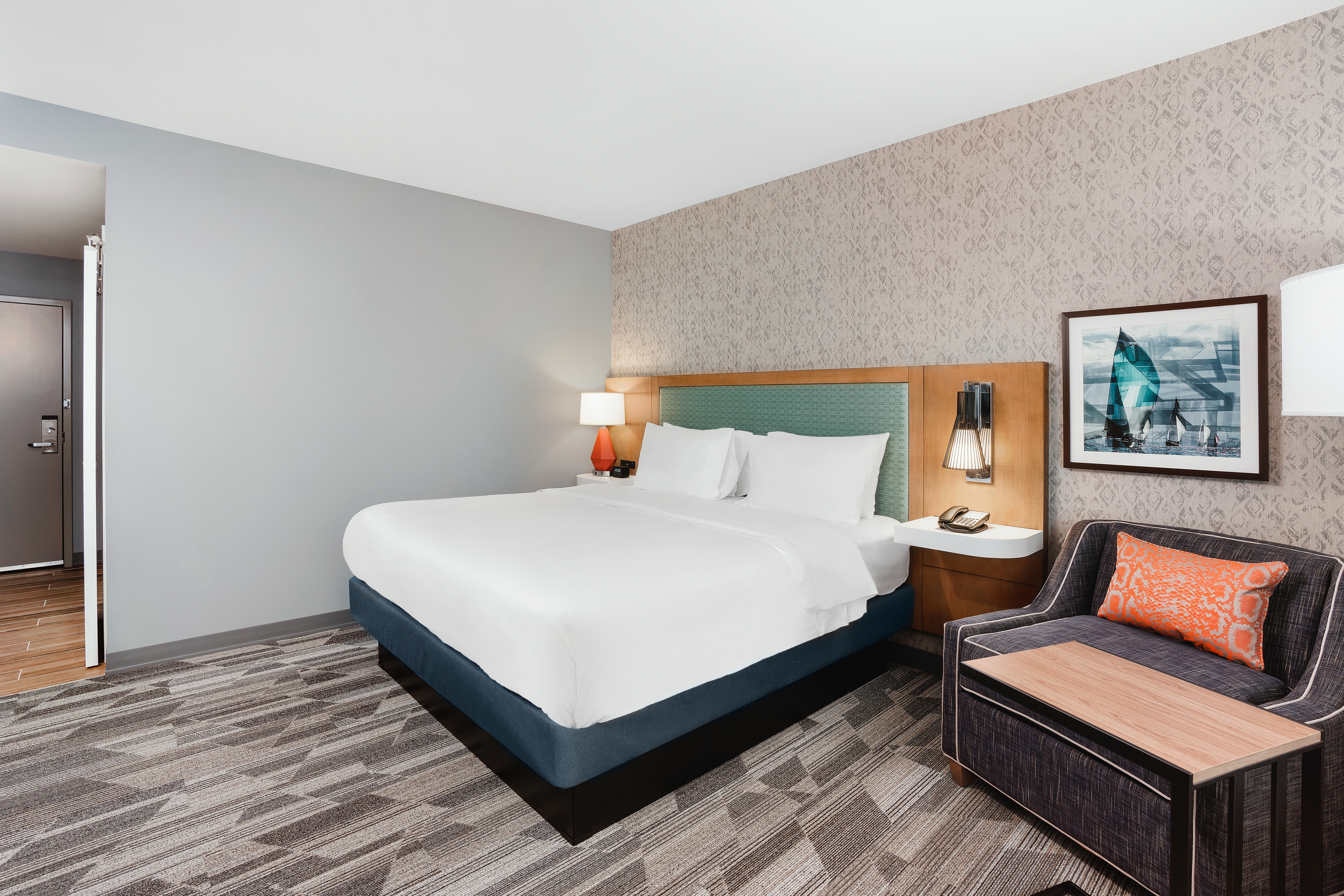 King bed room with comfortable lounge area