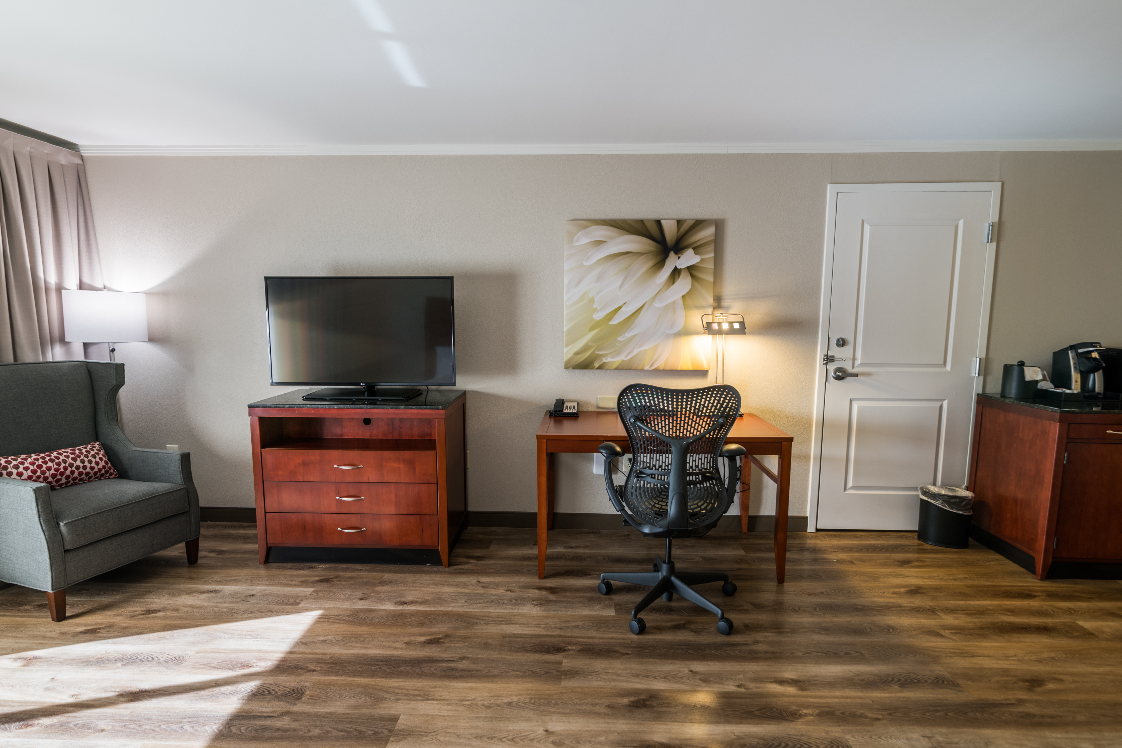 Guest Room With TV, Work Desk, and Chair