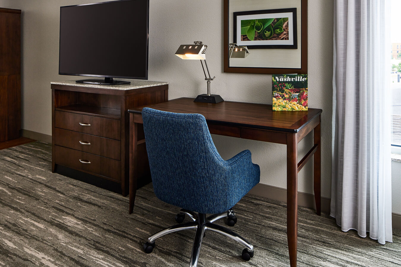 HDTV and Desk Area in a Hotel Room