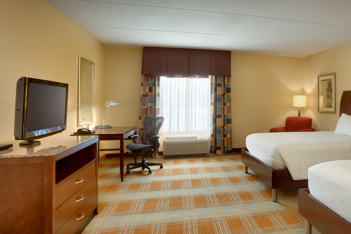 Room with Desk TV and Two Beds