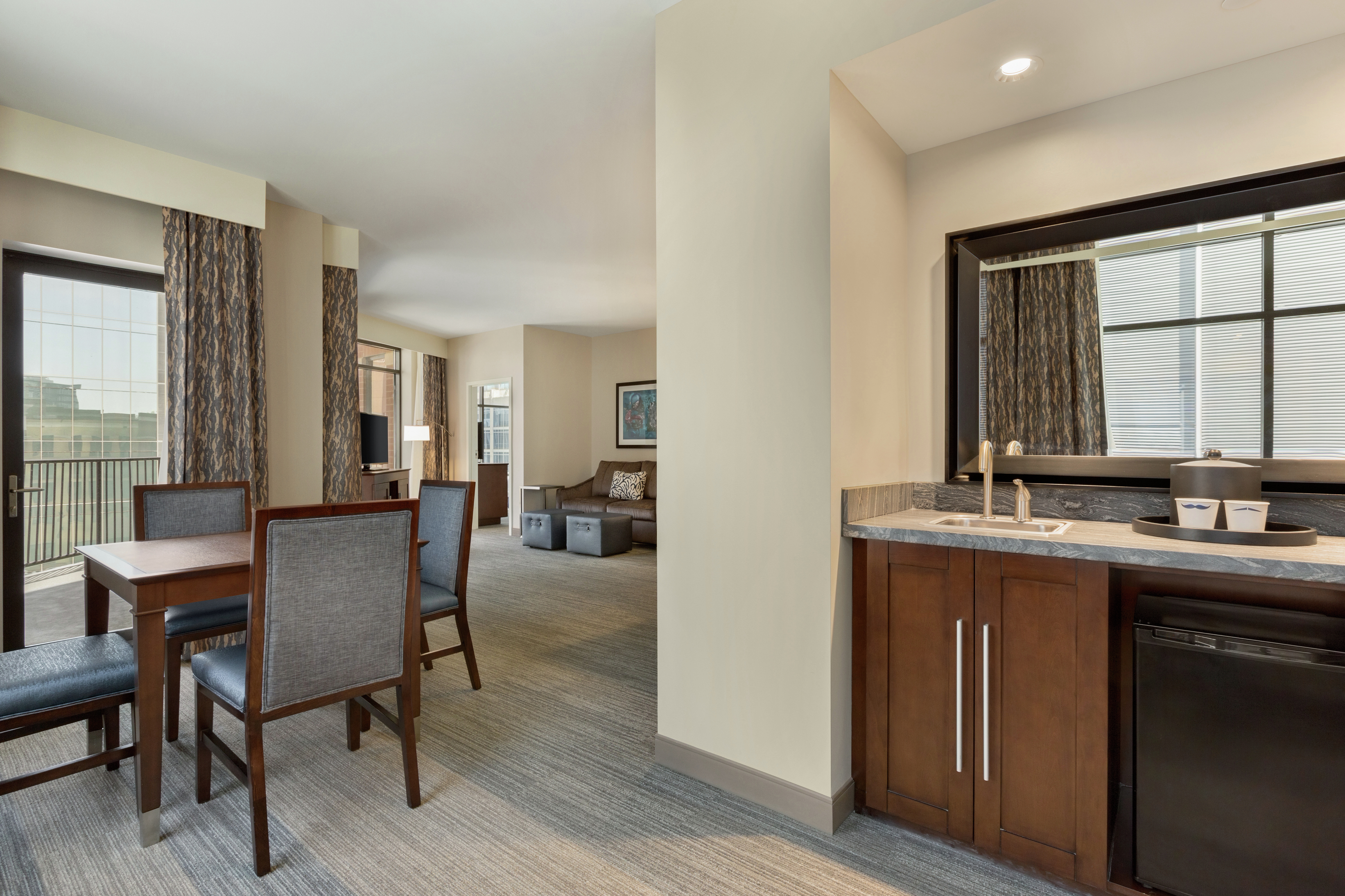 Kitchen area in suite with mirror