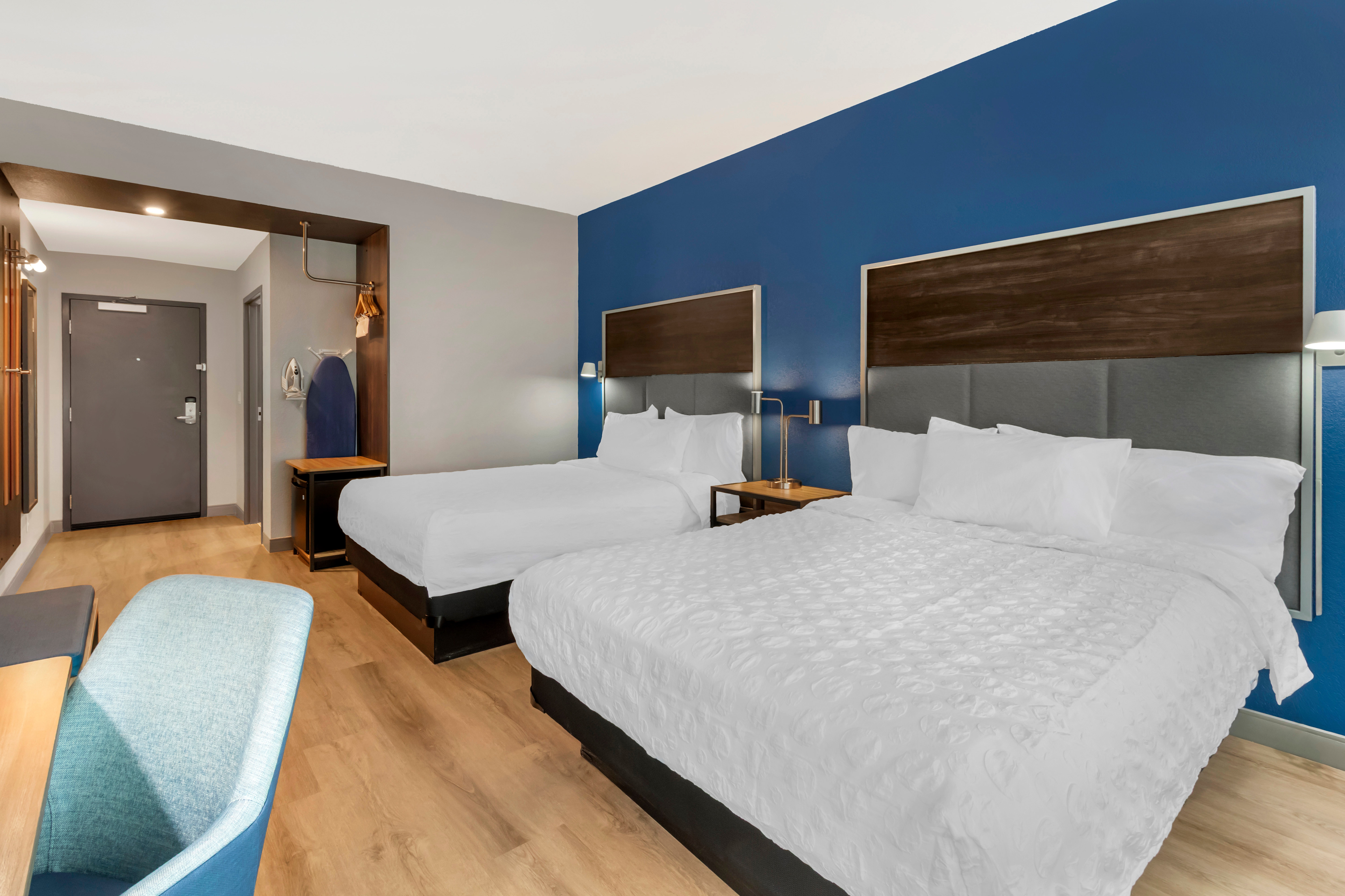Two Guestroom beds and work desk