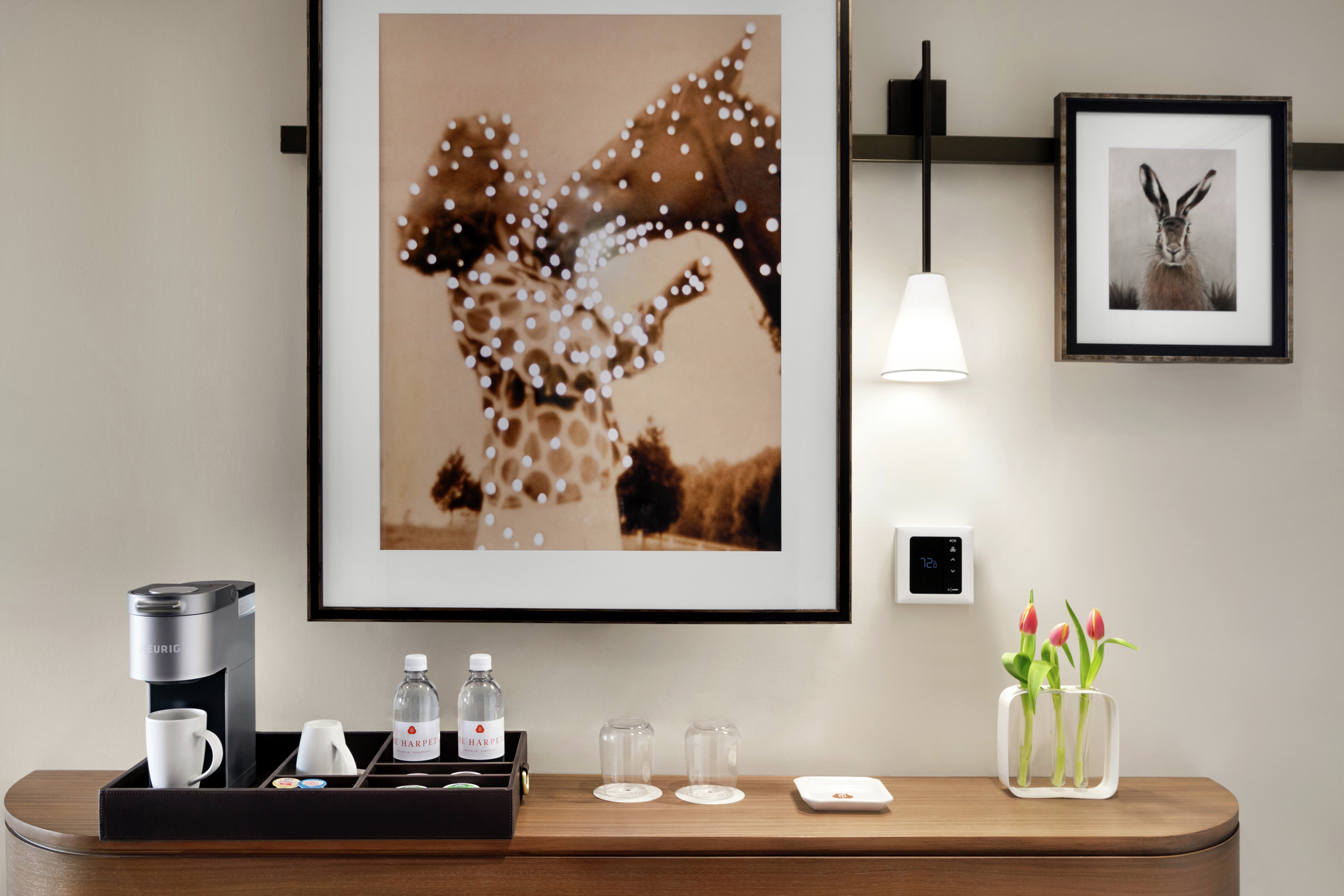 Desk in room with coffee machine