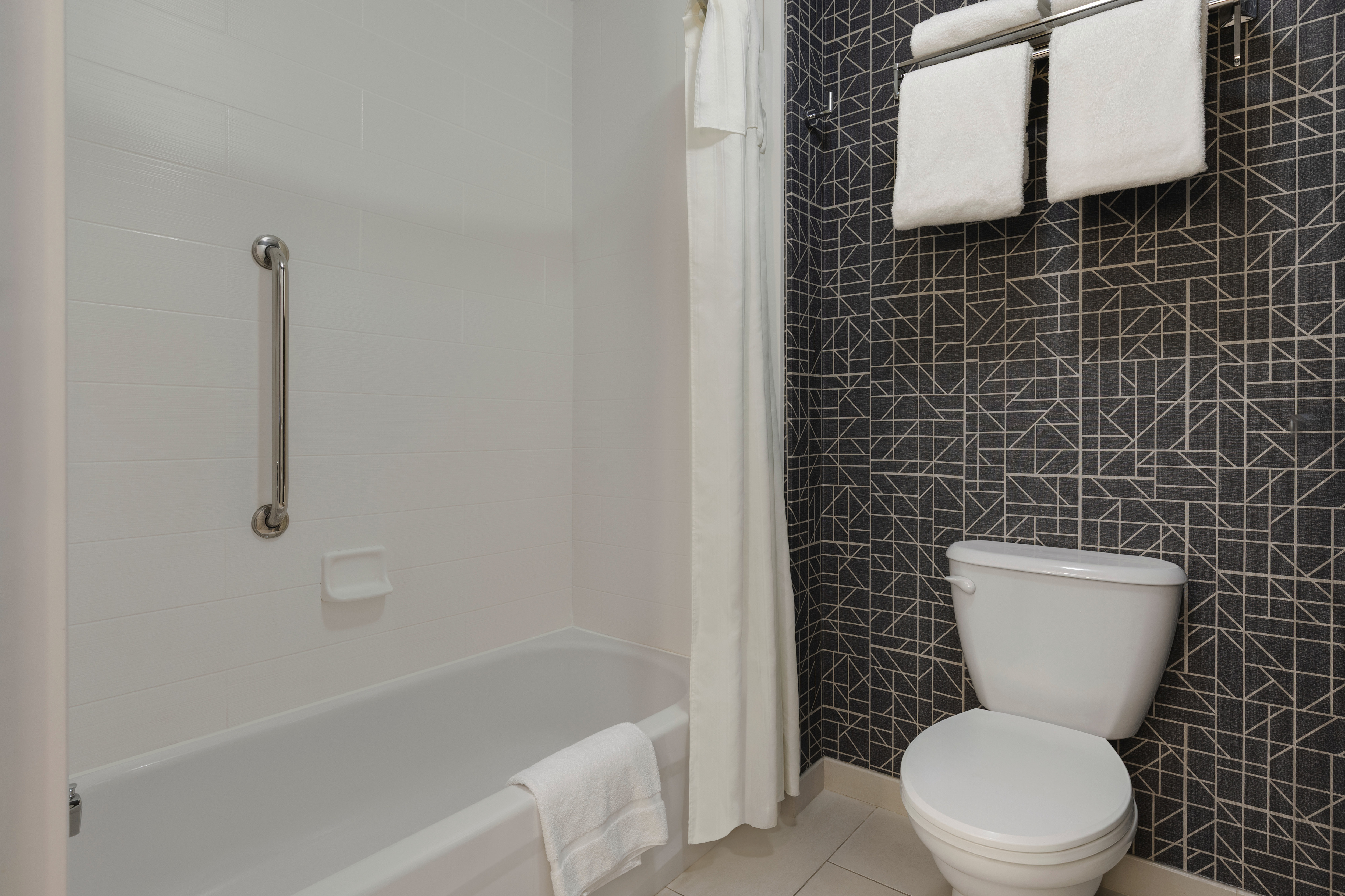 Suite bathroom with a spacious bathtub 