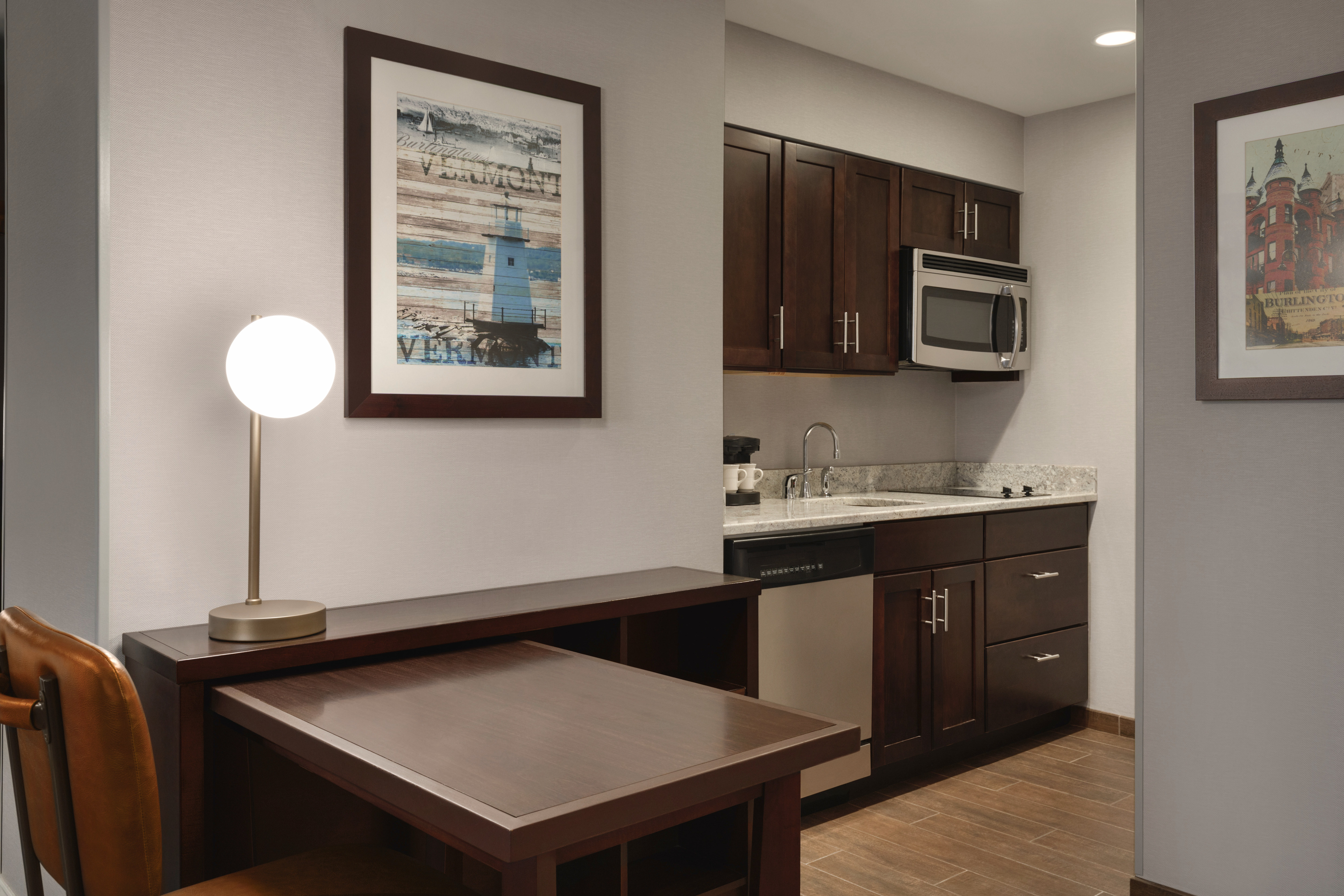 In-suite kitchen with a full sized microwave and dishwasher