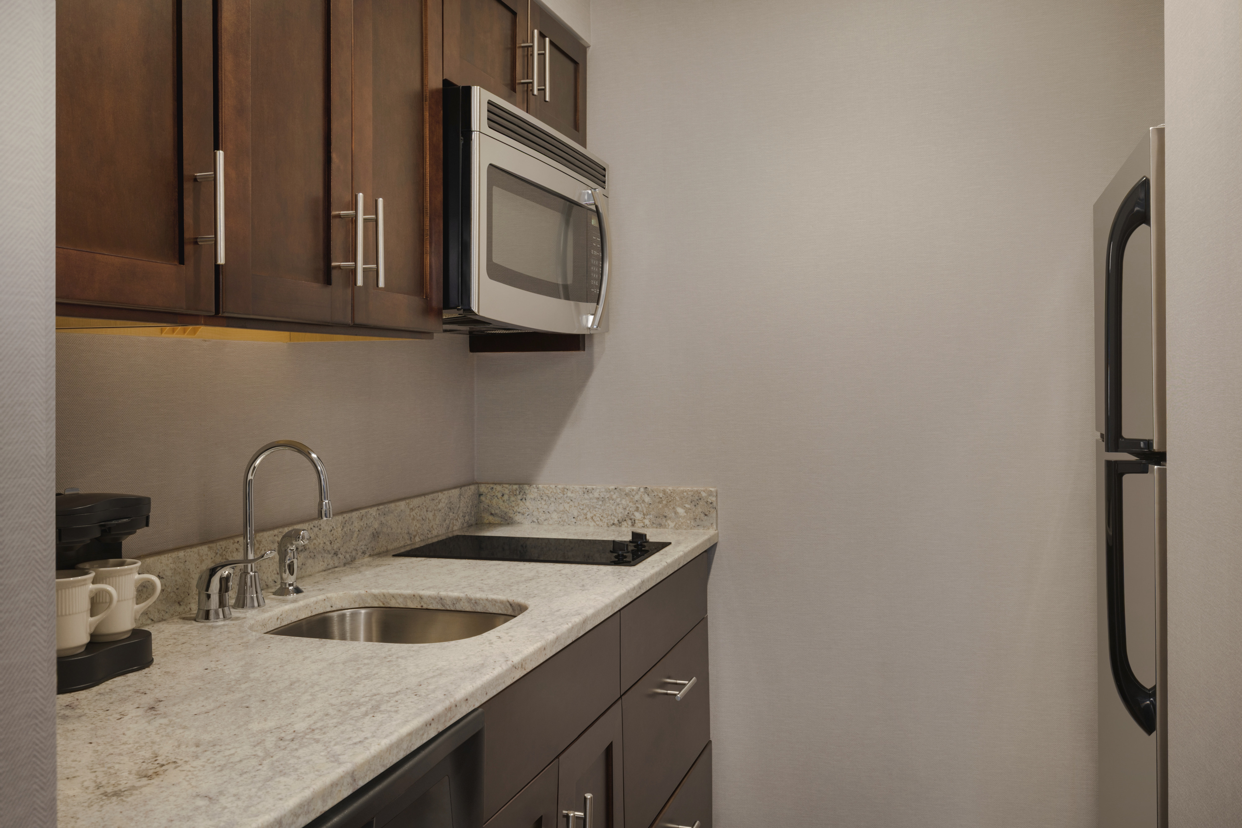 Suite kitchen with modern appliances 