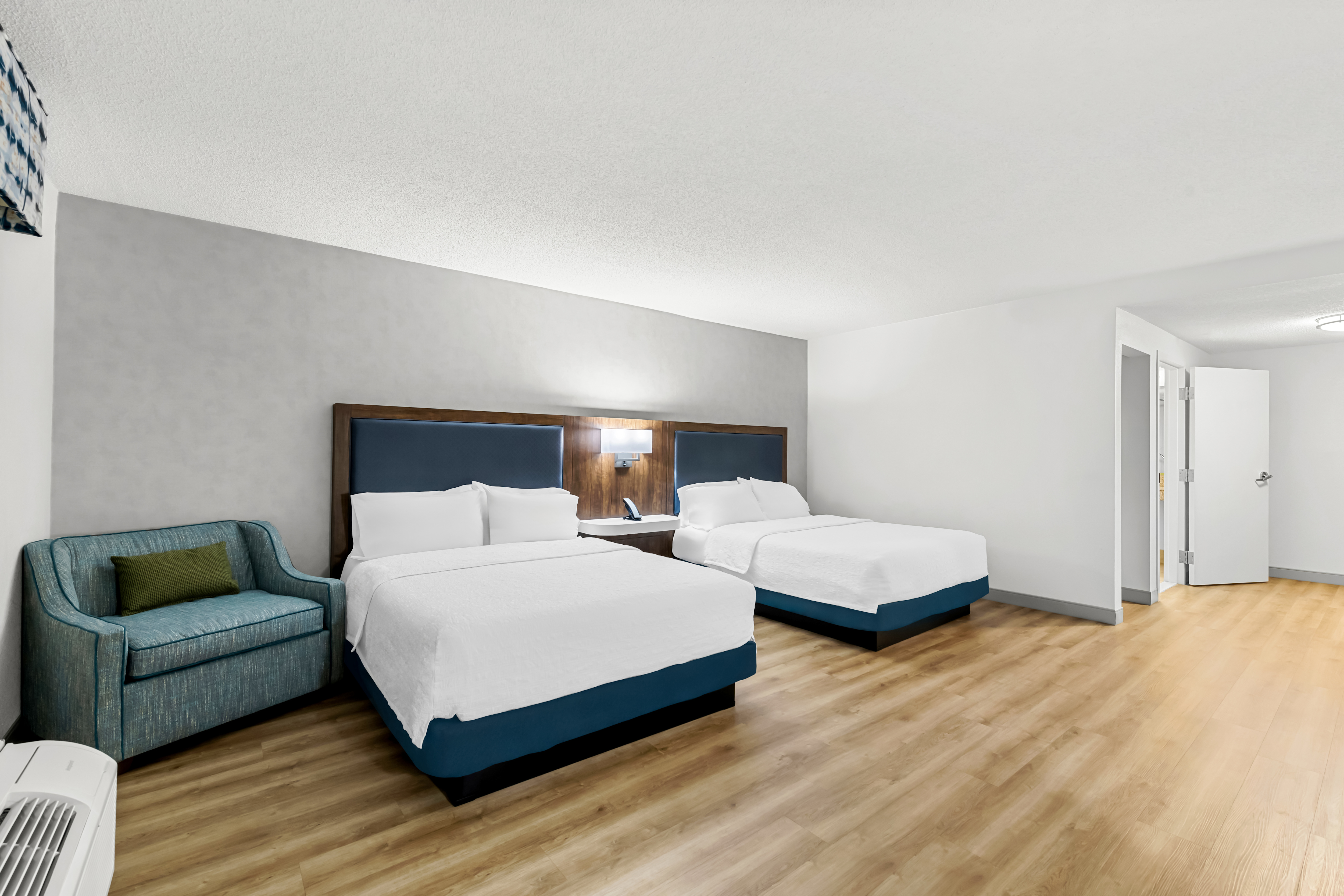 double beds view with entry area on right