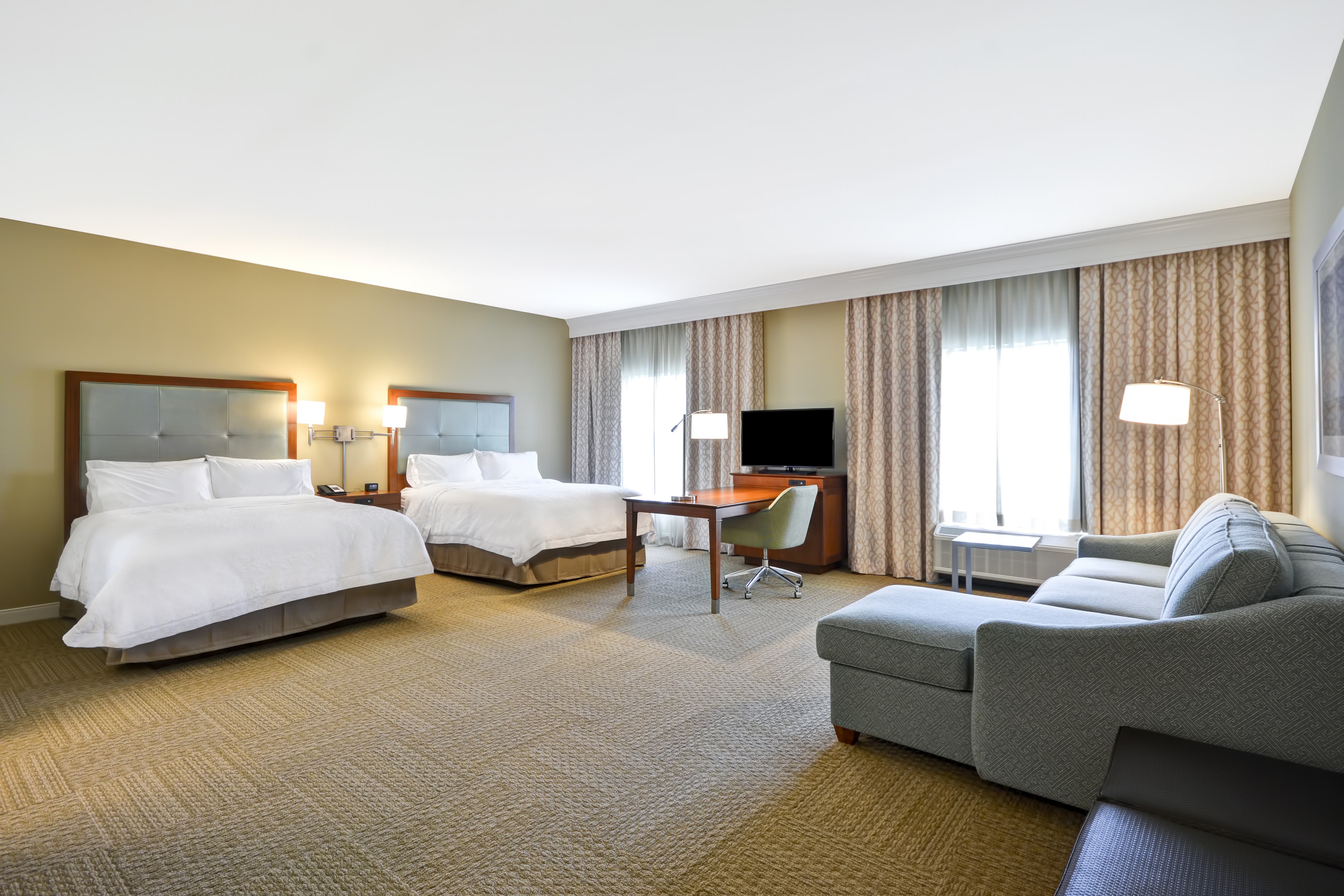 Two Queen Beds and Sofabed in Studio Suite