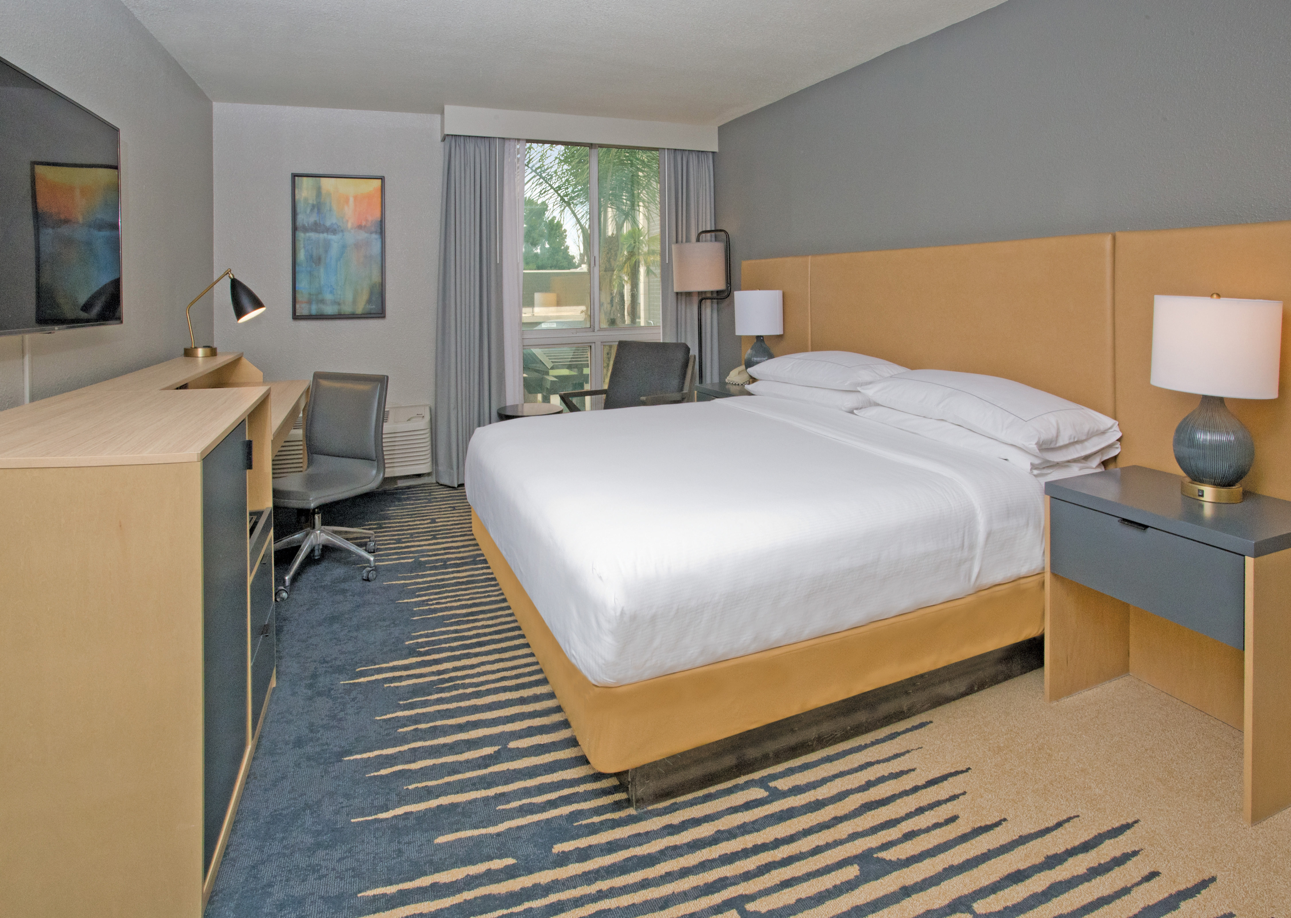 Guest Room with Large Bed and Desk