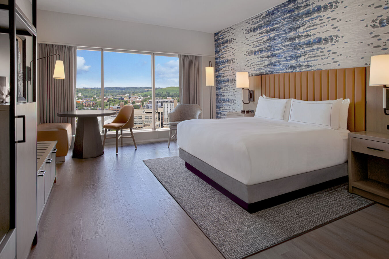 King bedroom with seating with a table
