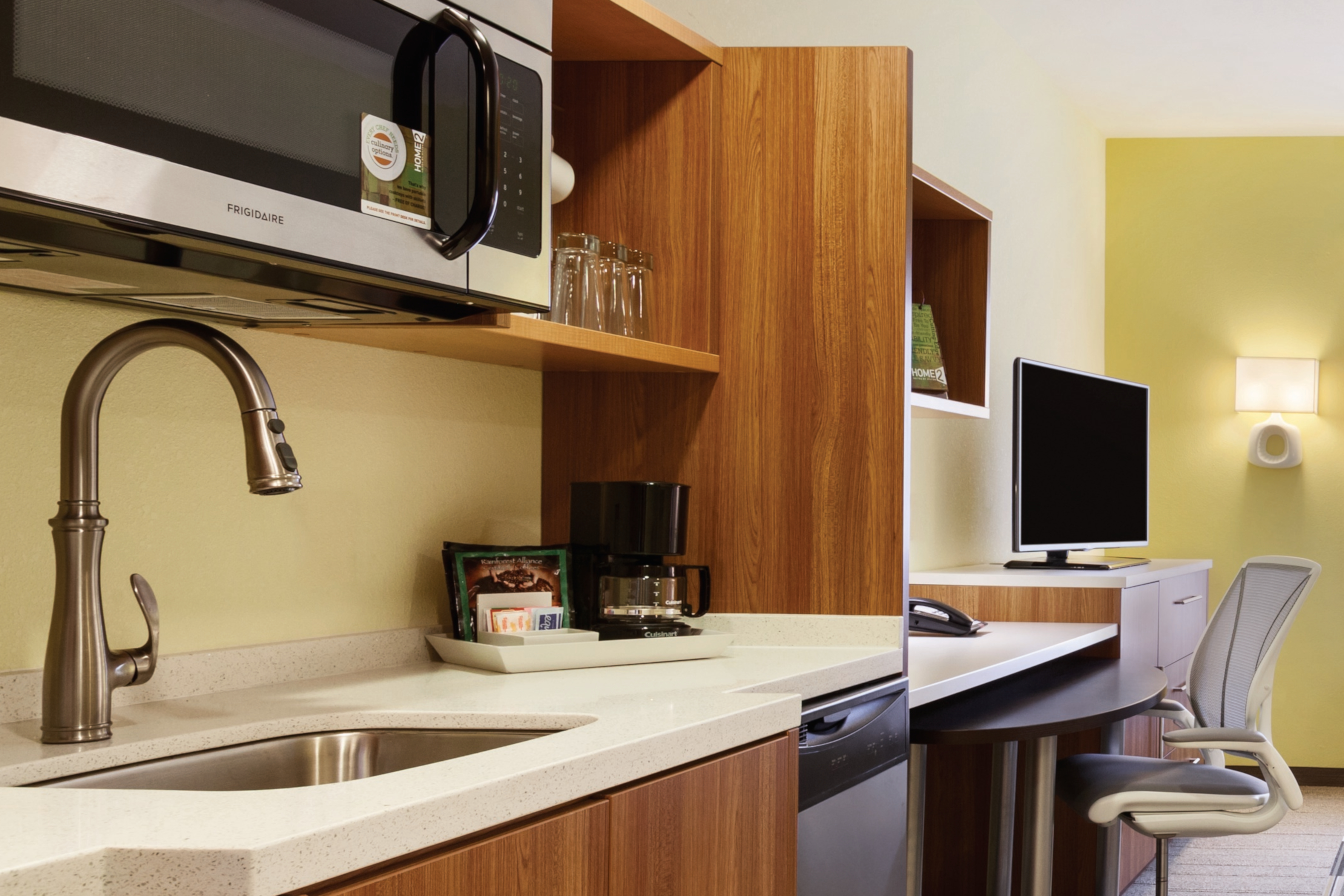 Each suite features a kitchenette with microwave and fridge.