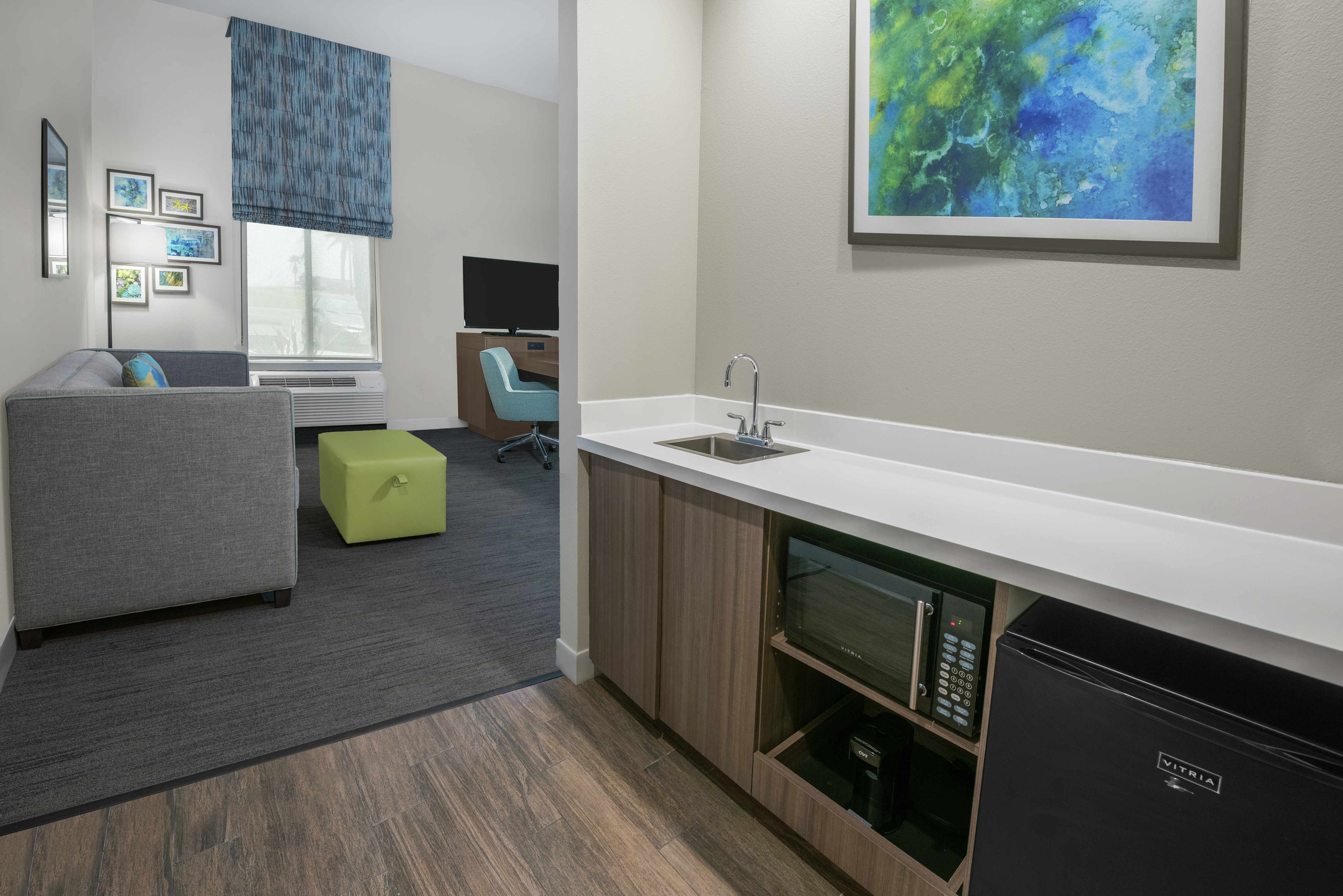 Suite Wet Bar Area and Partial View of Living Room