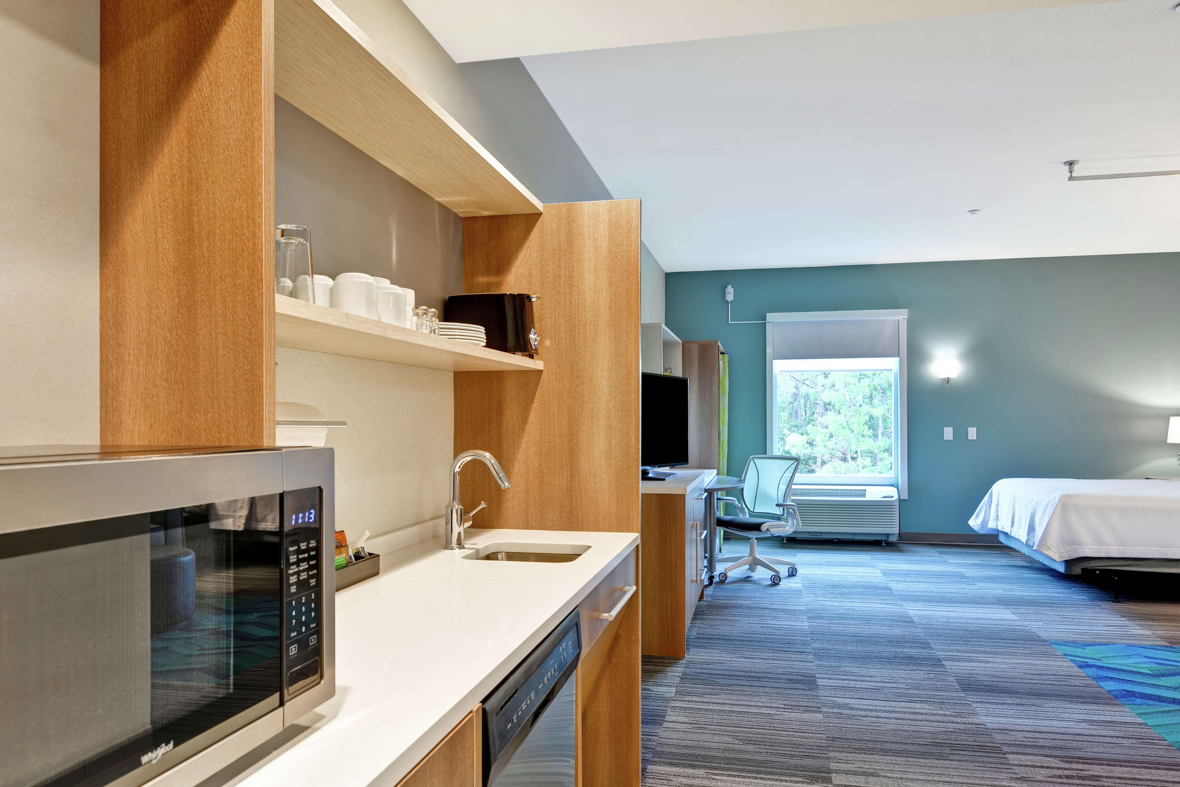 Kitchen with Appliances and Bedroom