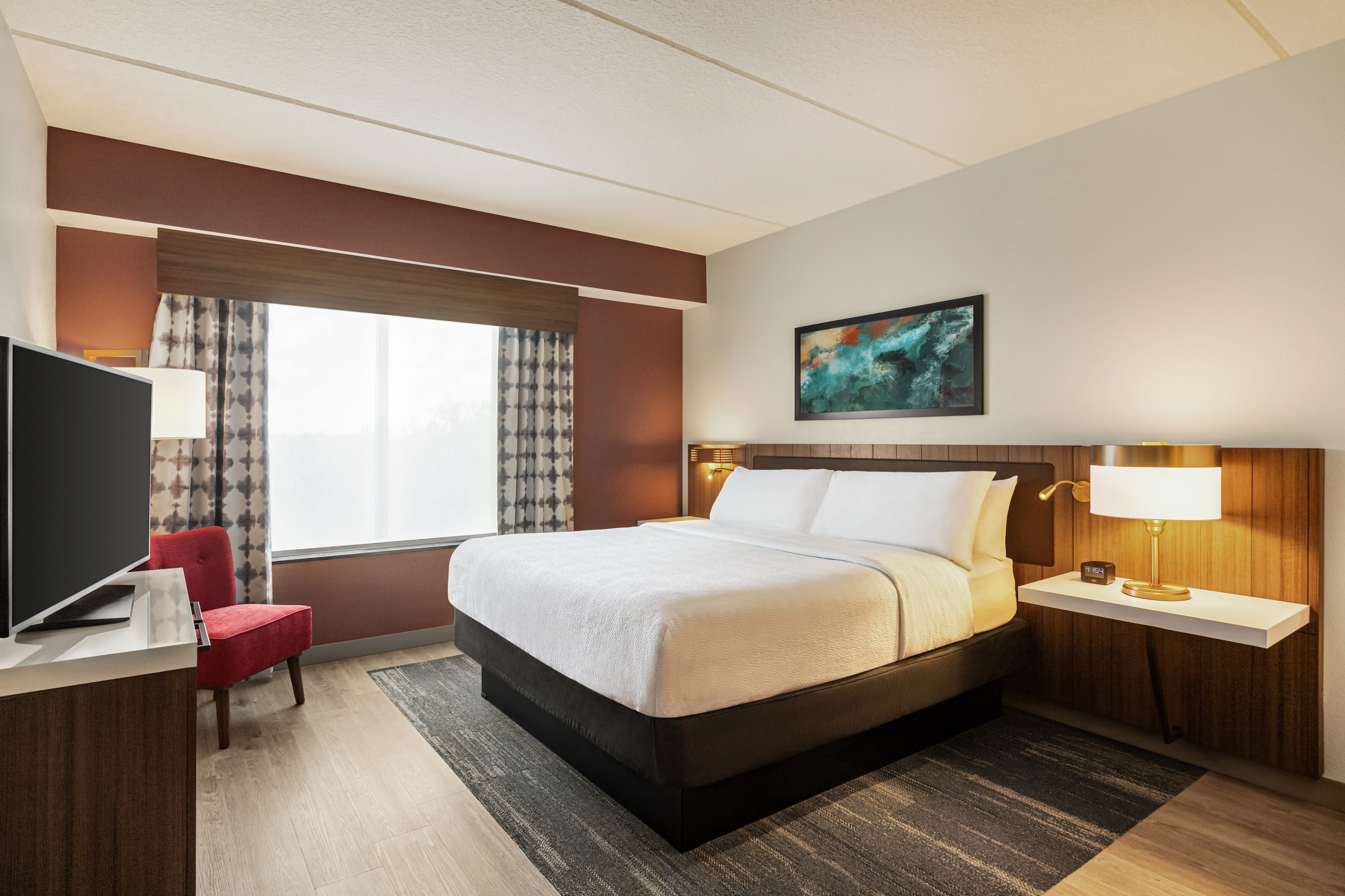Stunning guest suite bedroom with ample natural light