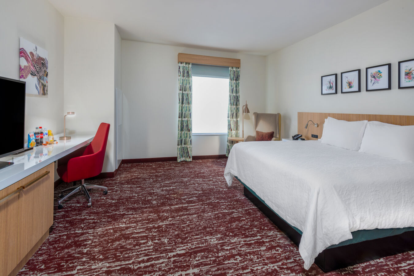 Deluxe King Guest Room with Snacks HDTV and Desk Area