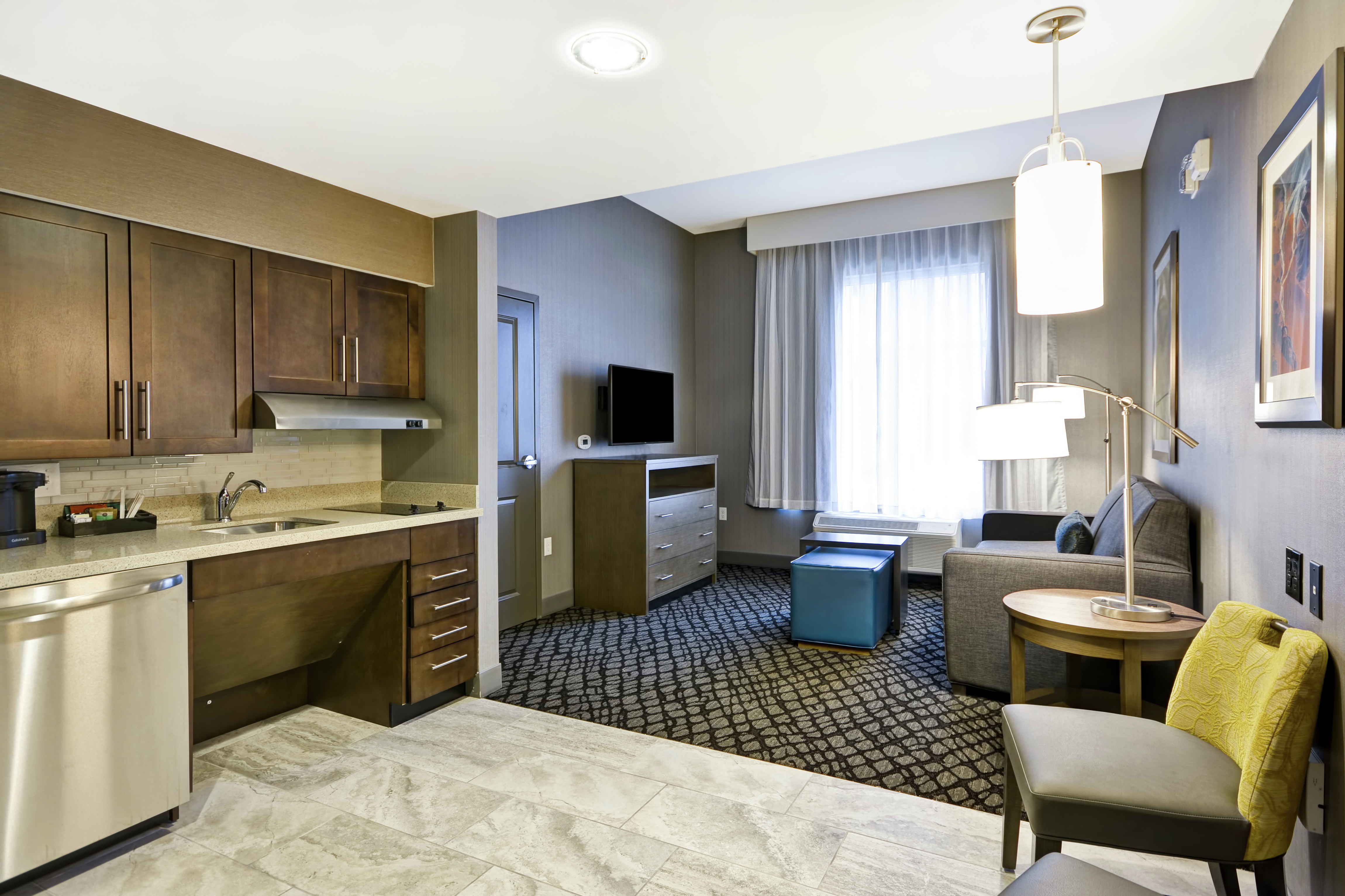 Accessible Guest Room with King Bed, Lounge Are, TV, and Kitchenette