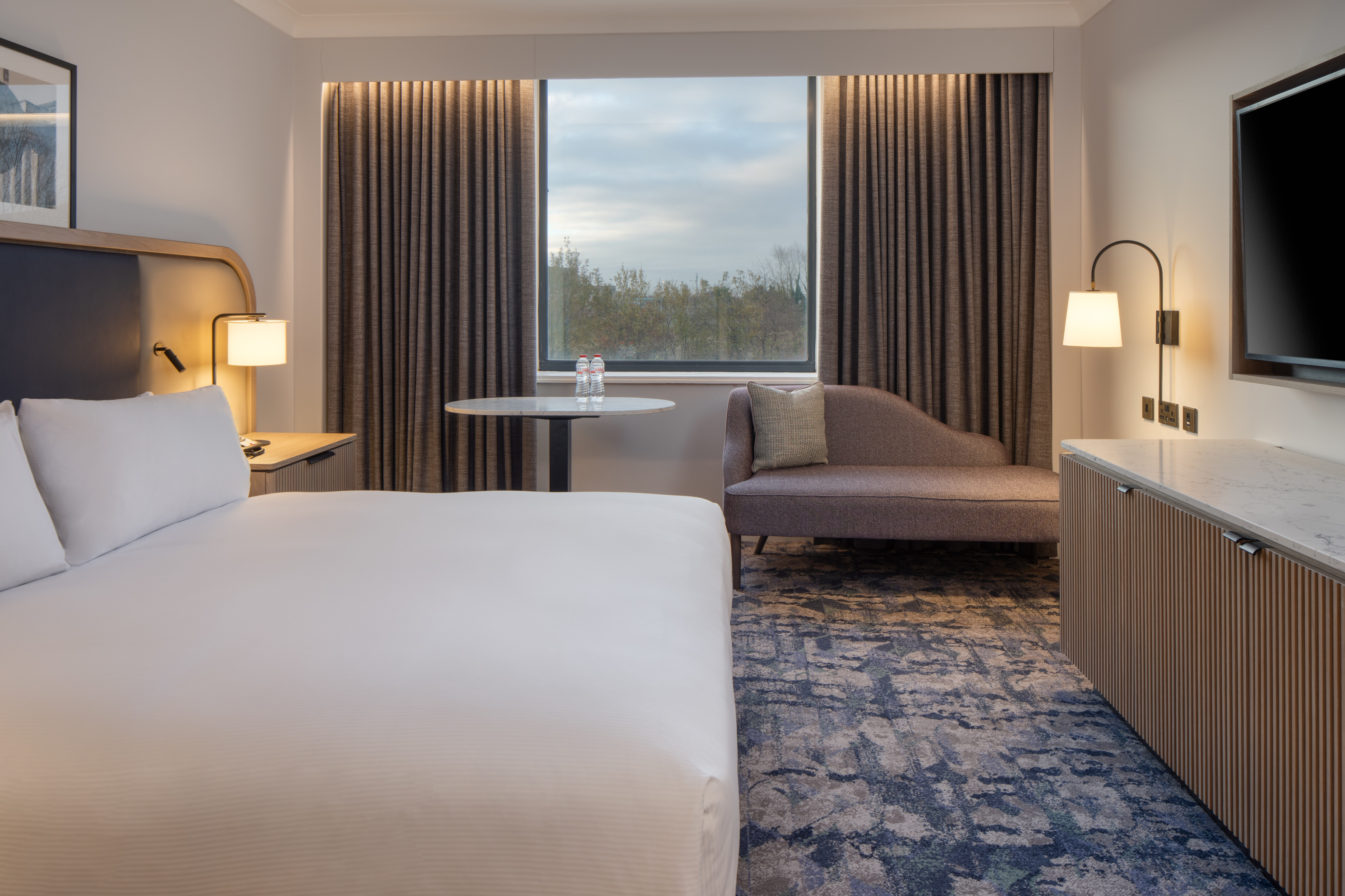 Guest Room with One King Bed, chair and tv