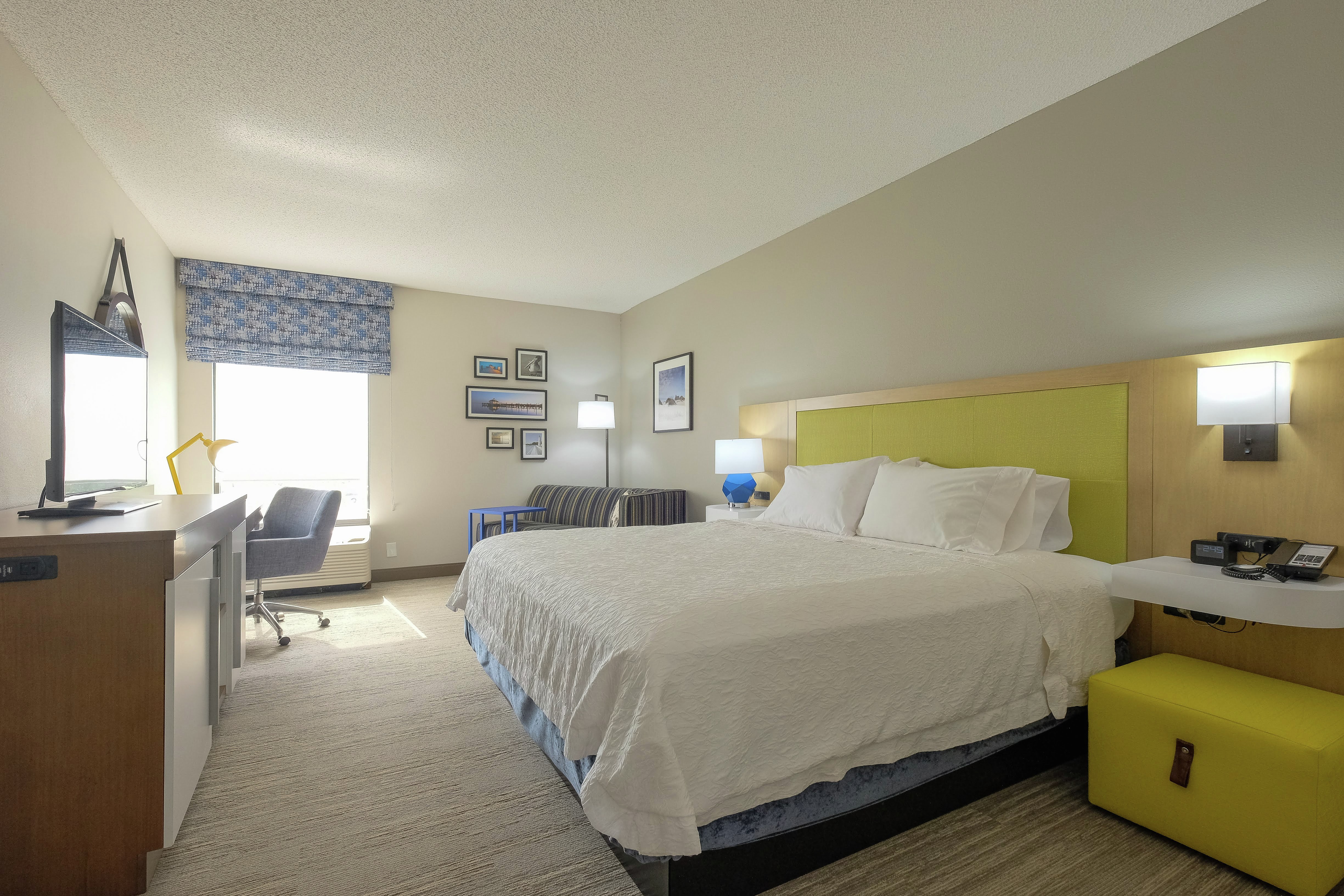 King Bed, TV, and Couch in Guest Room