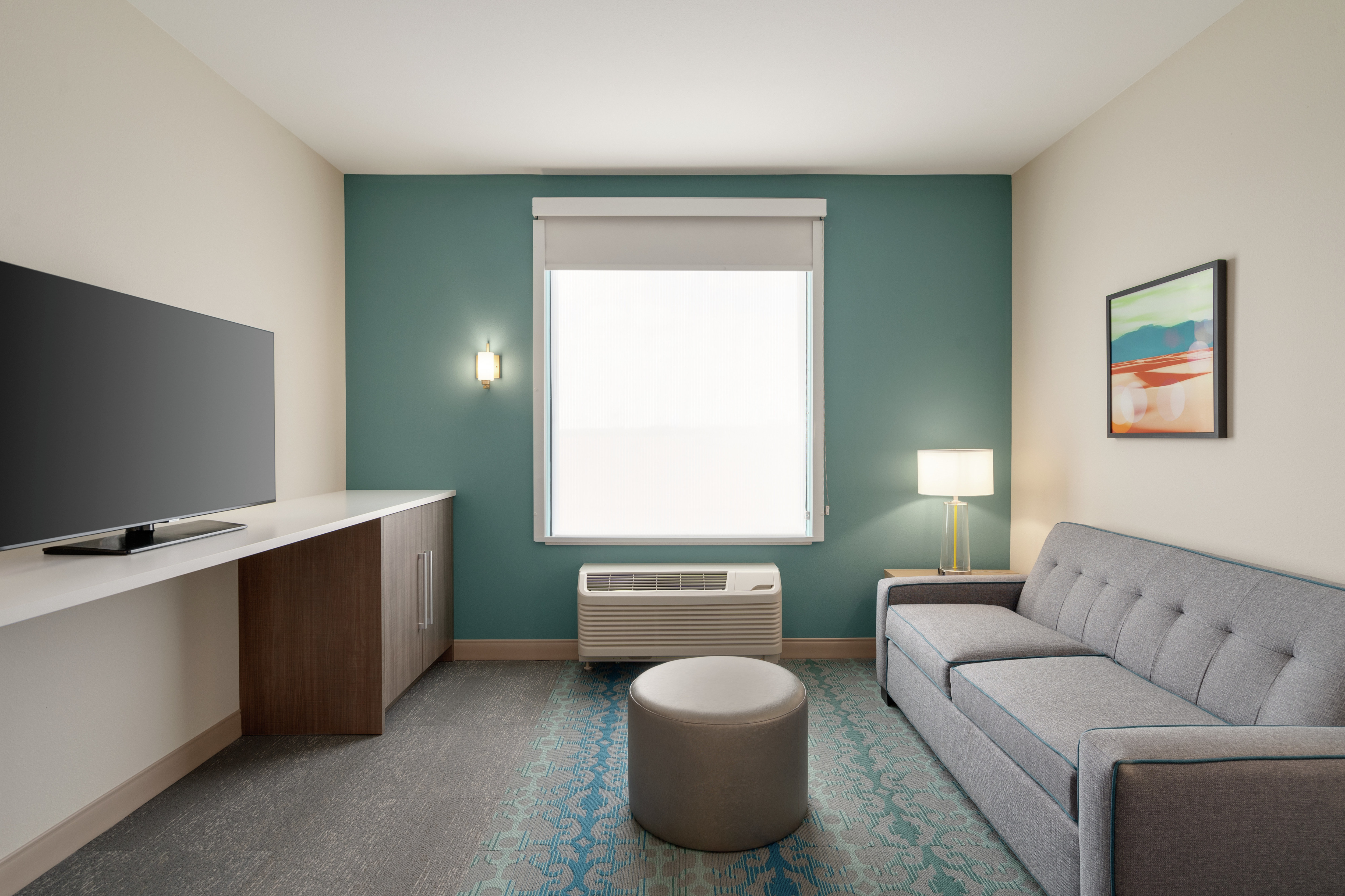 Queen Suite Lounge Area With TV