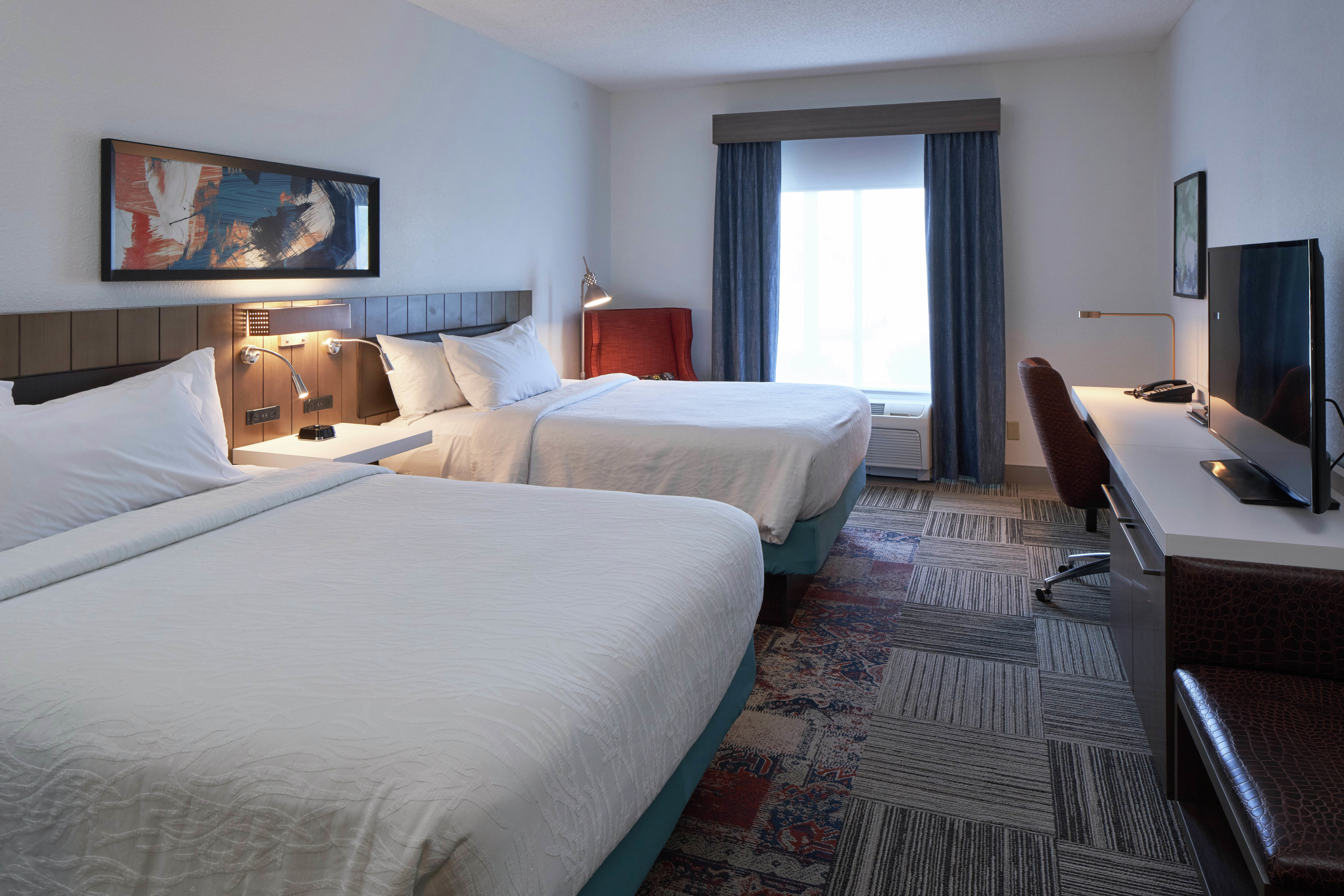 Guest Room with Double Queen Beds, Television and Work Desk