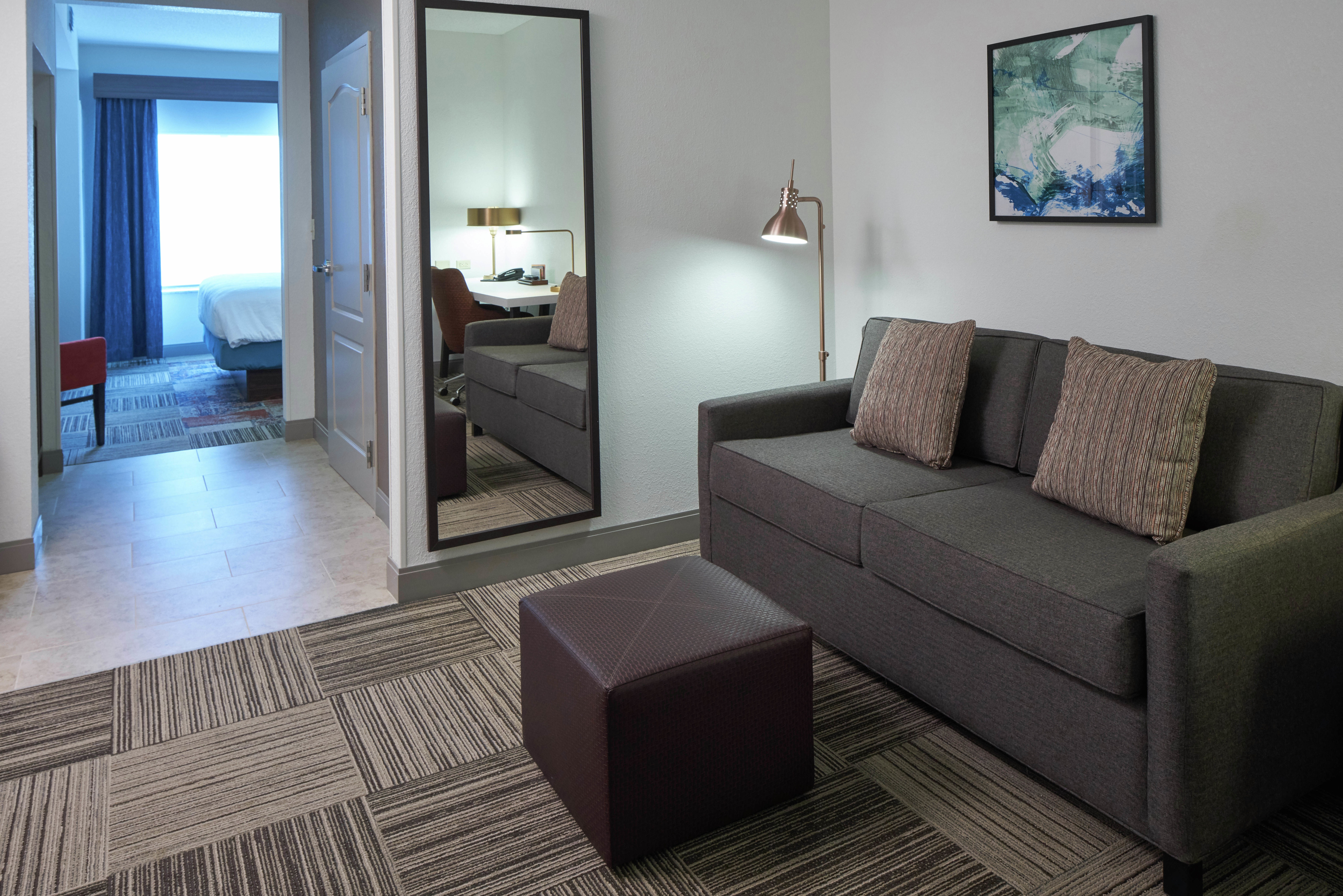 King Jr. Suite Living Room with Sofa and Work Desk
