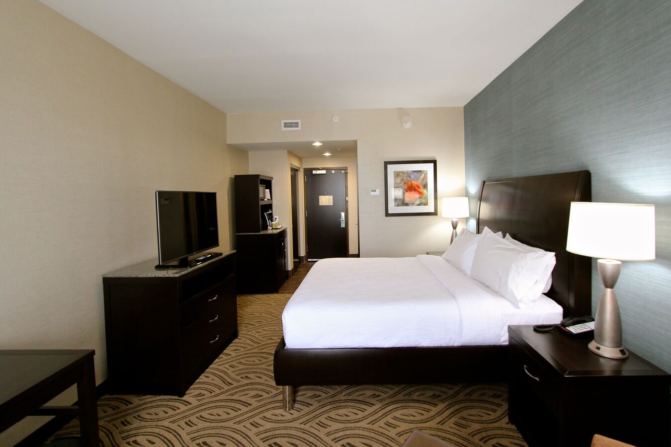 Guest Room with One King Bed and tv