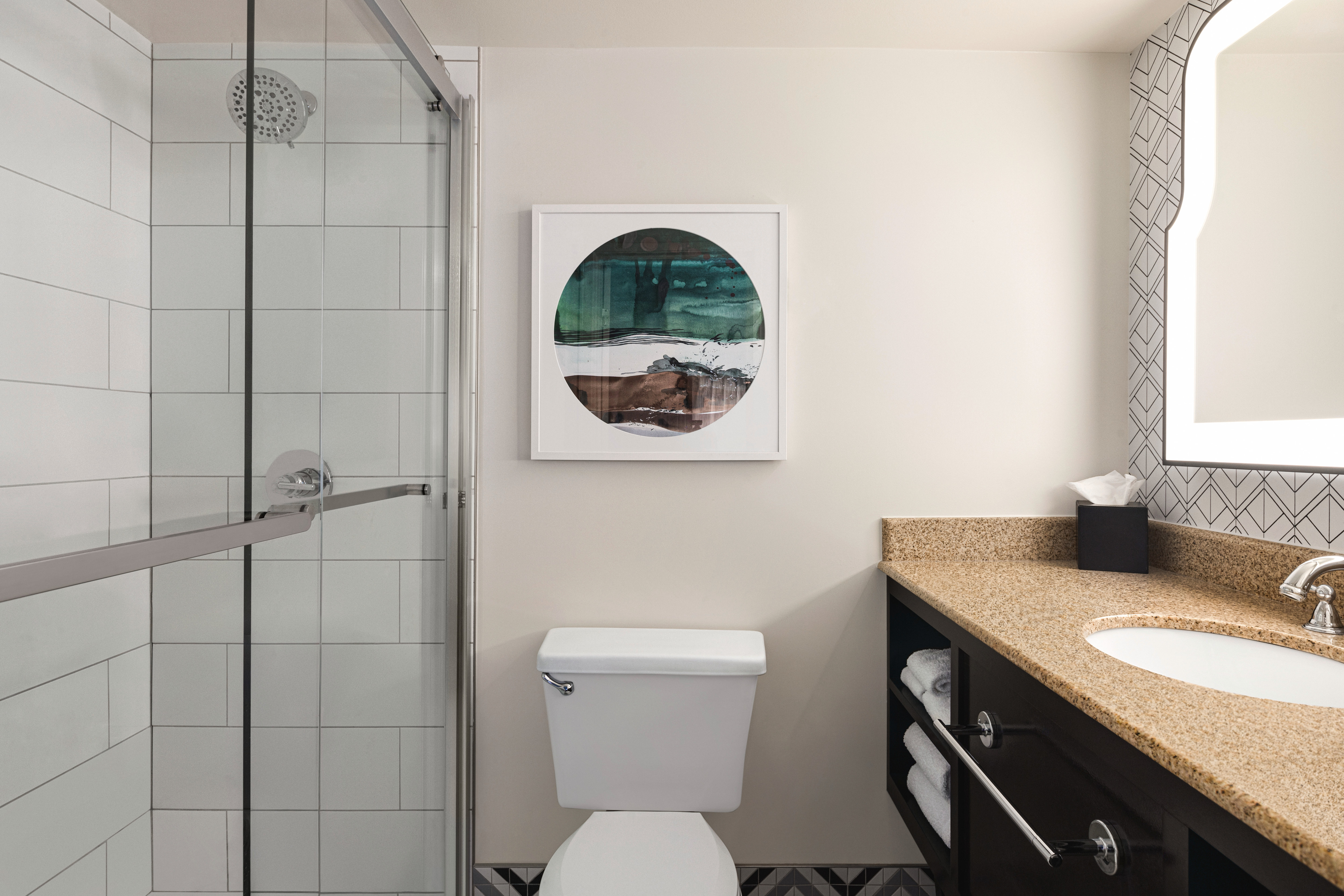Bright bathroom with a spacious glass shower