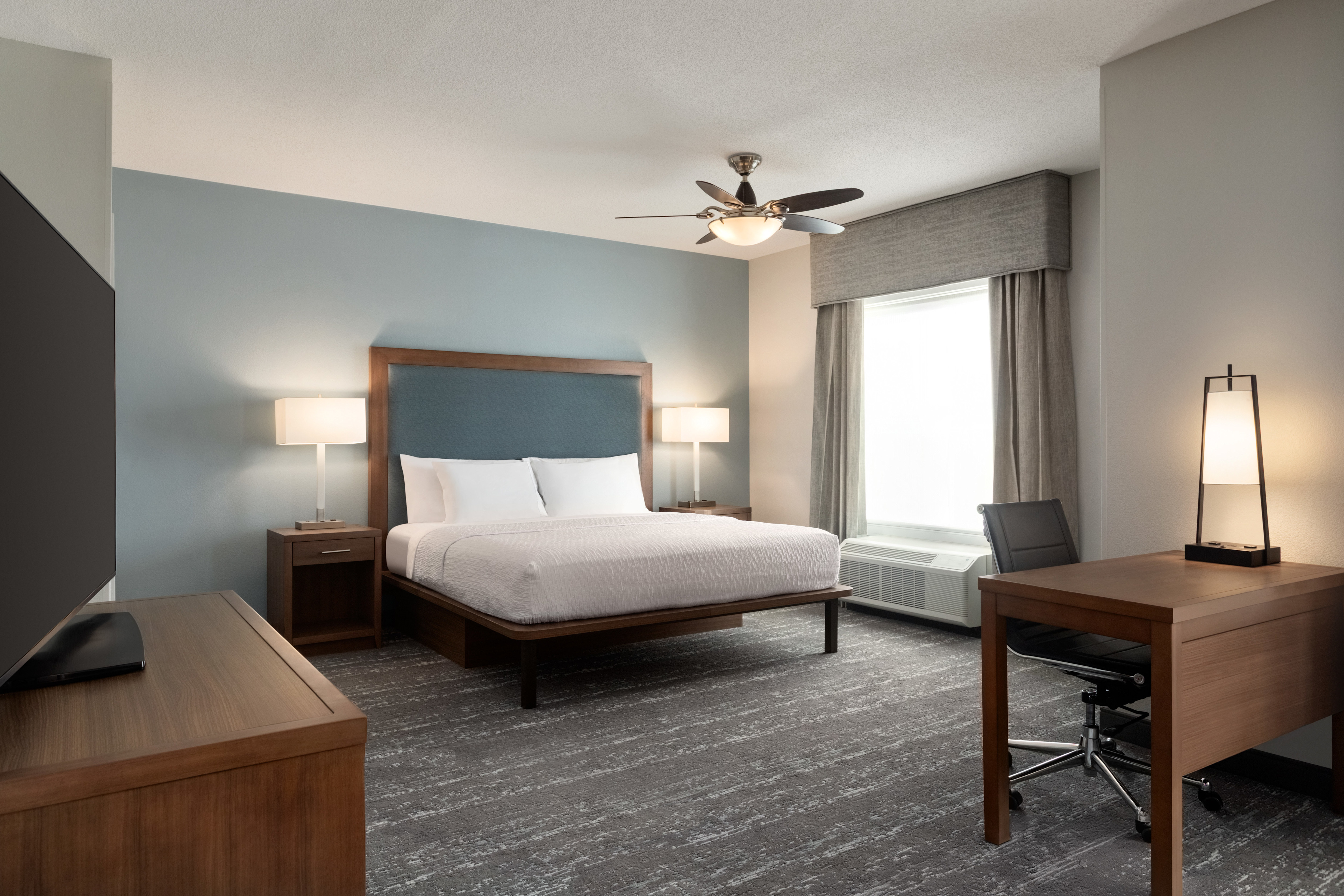 Stunning studio with a spacious king bed, work desk and flat screen tv 