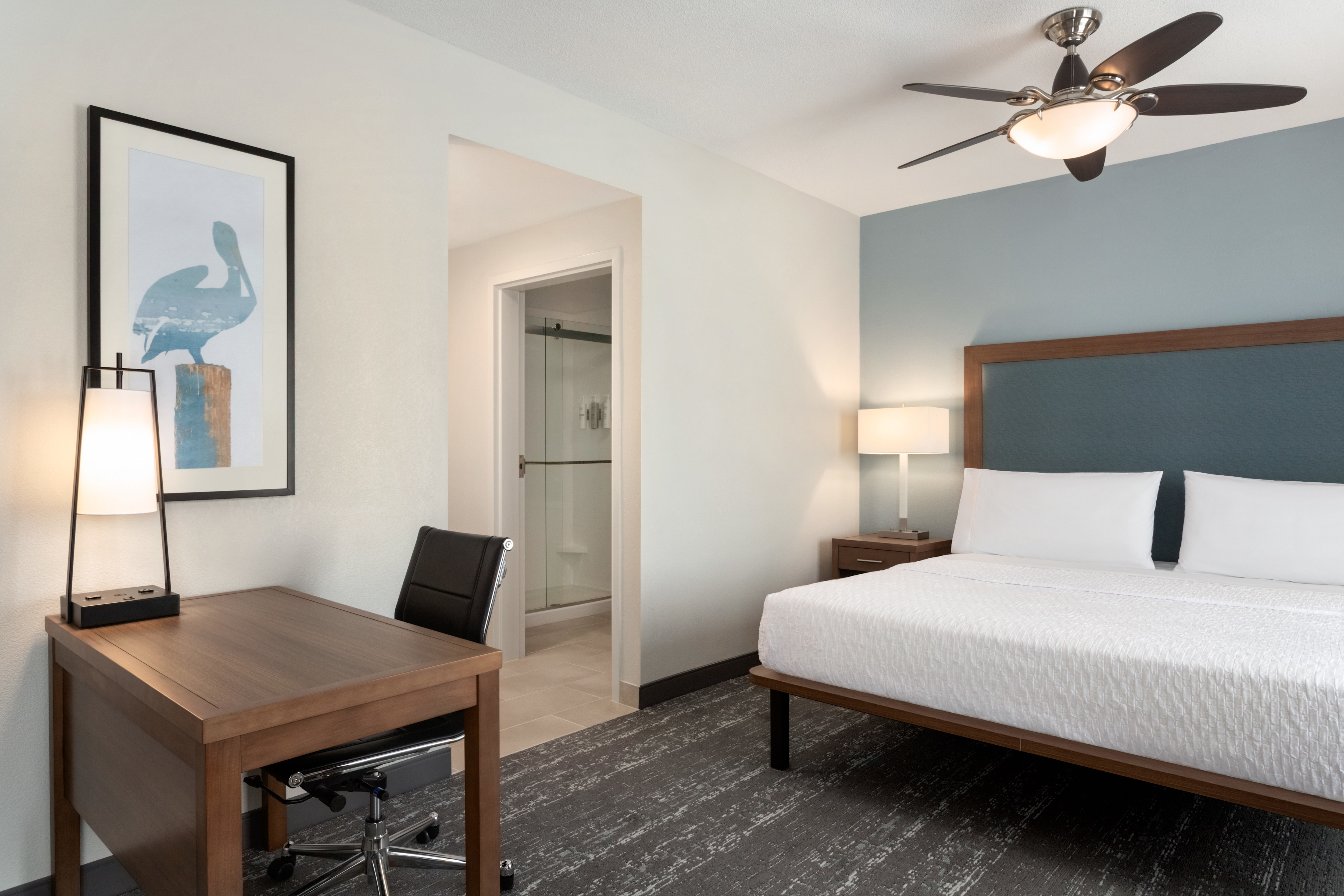 Suite with a work desk for guest convenience