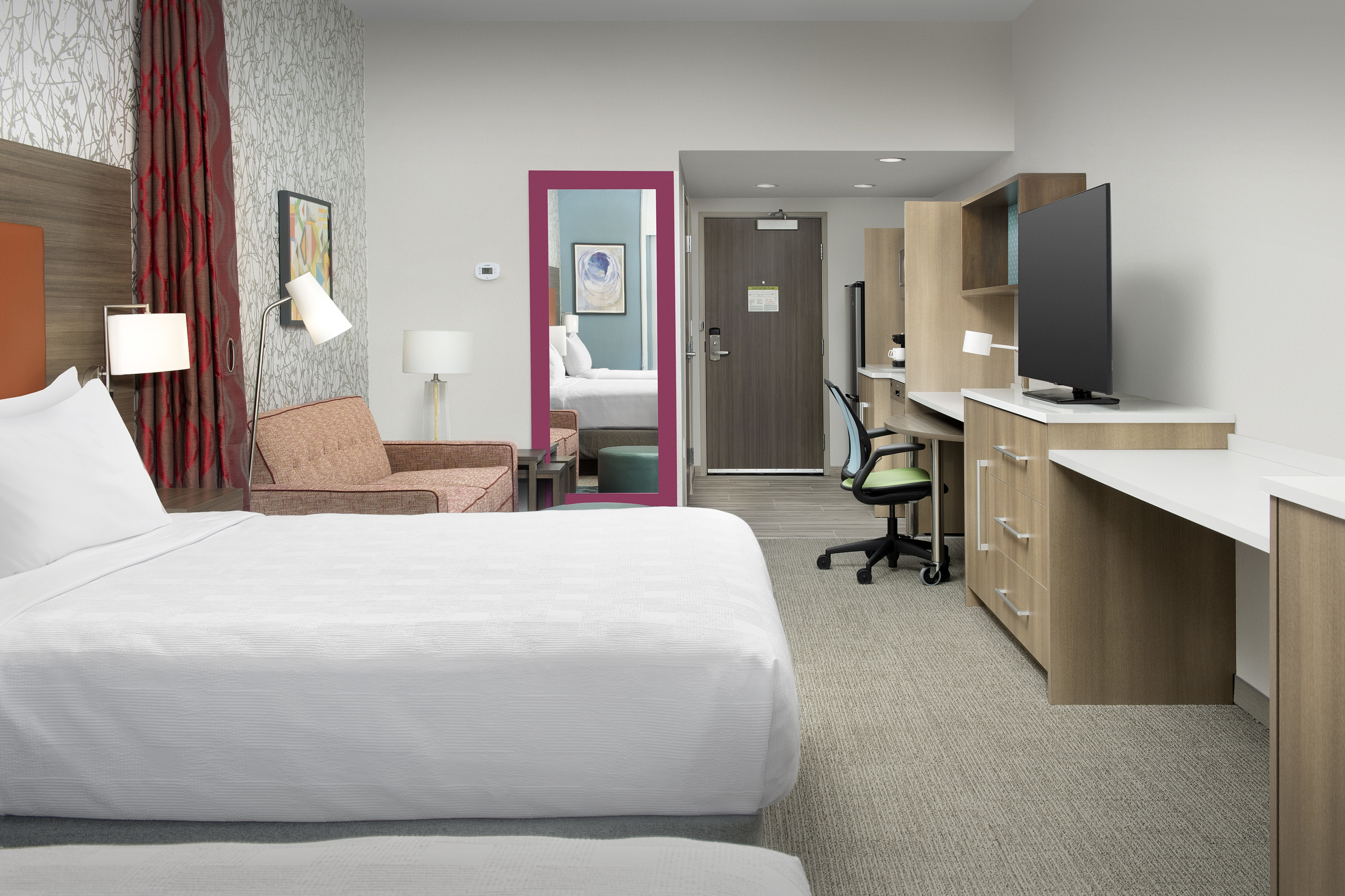Guestroom Suite with Two Queen Beds, Sofa and TV