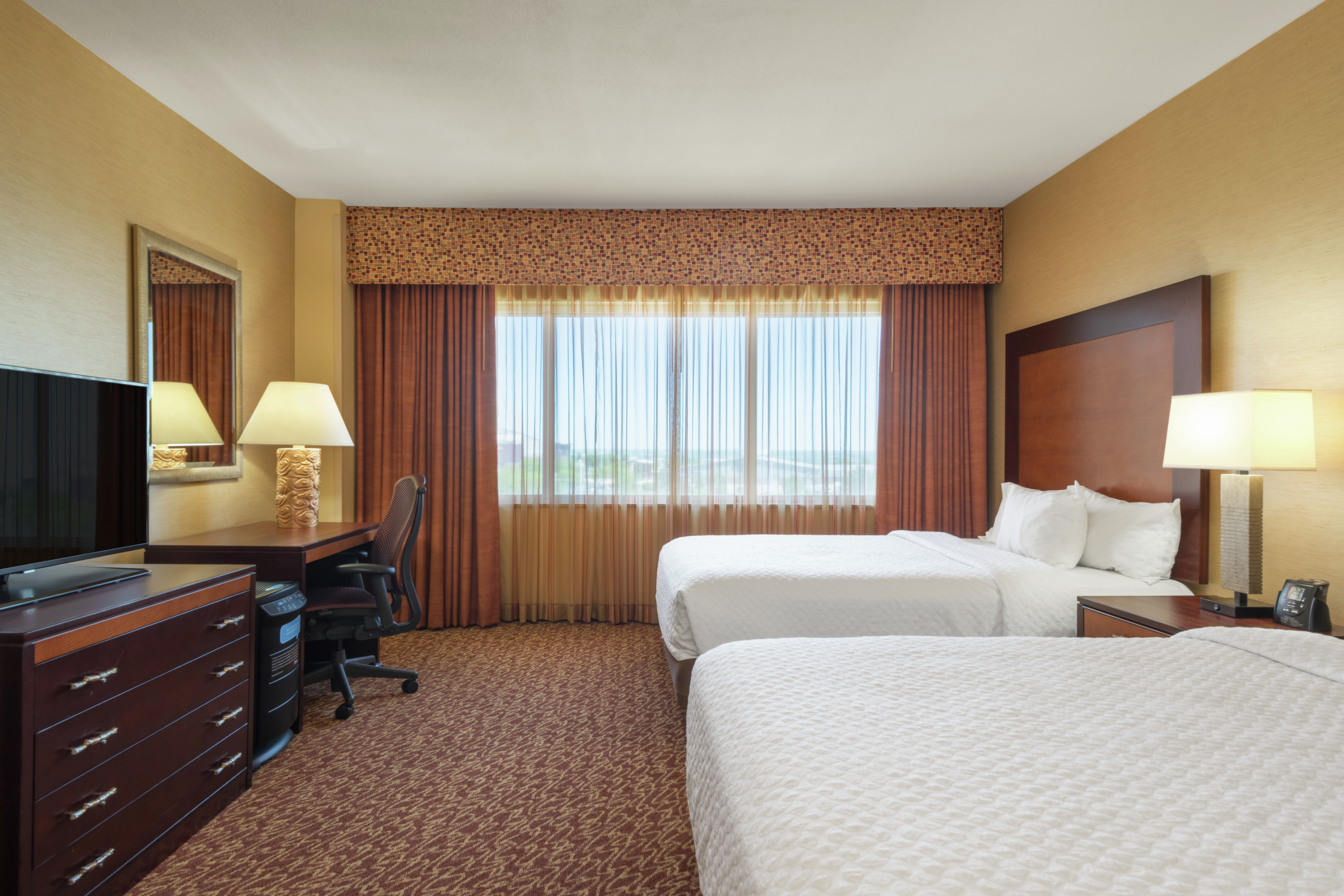 Double Queen Bed Pure Wellness Suite Bedroom