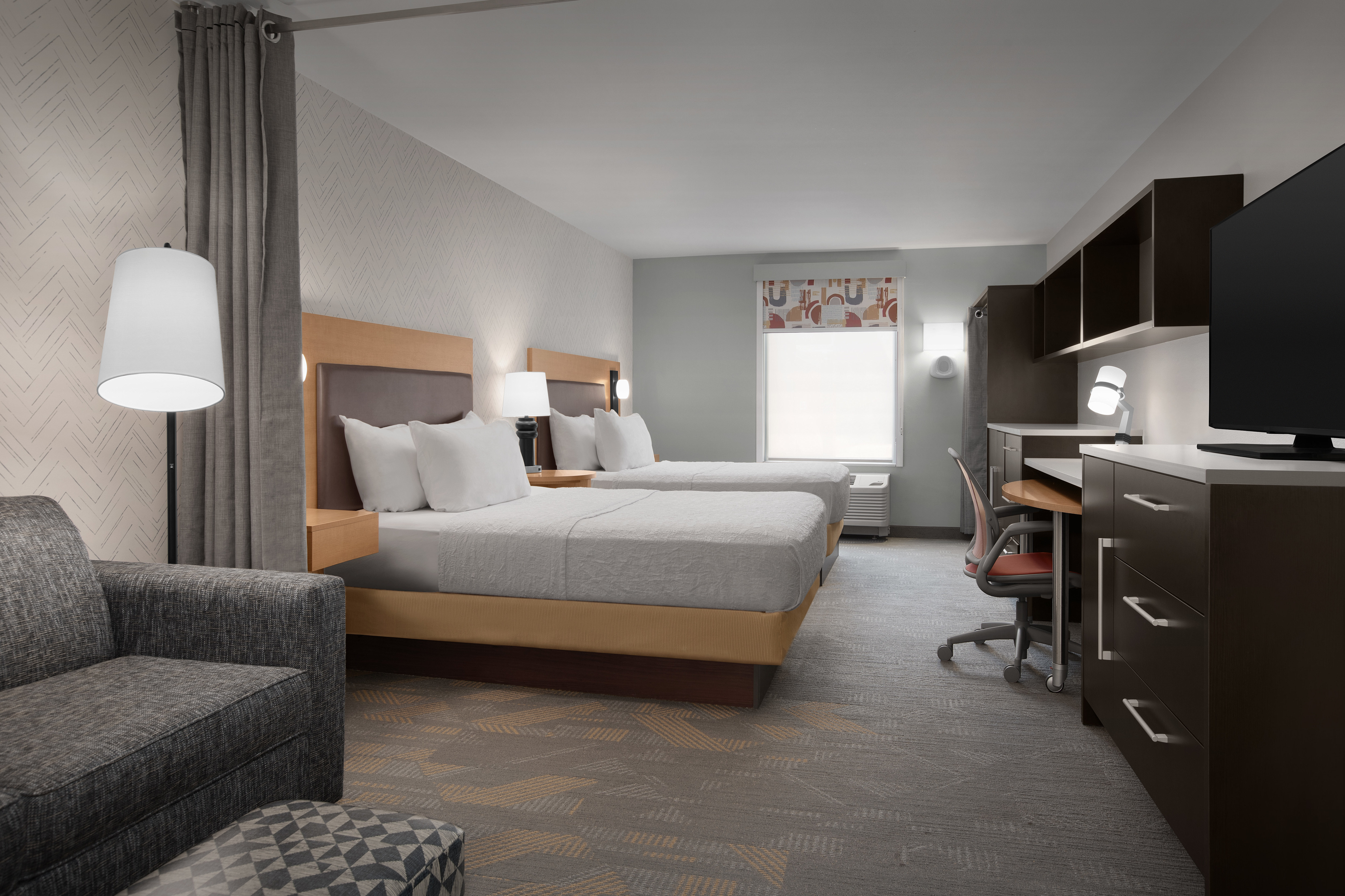Studio Suite with Two Queen Beds, Work Desk, Sofa, TV and Storage Dresser