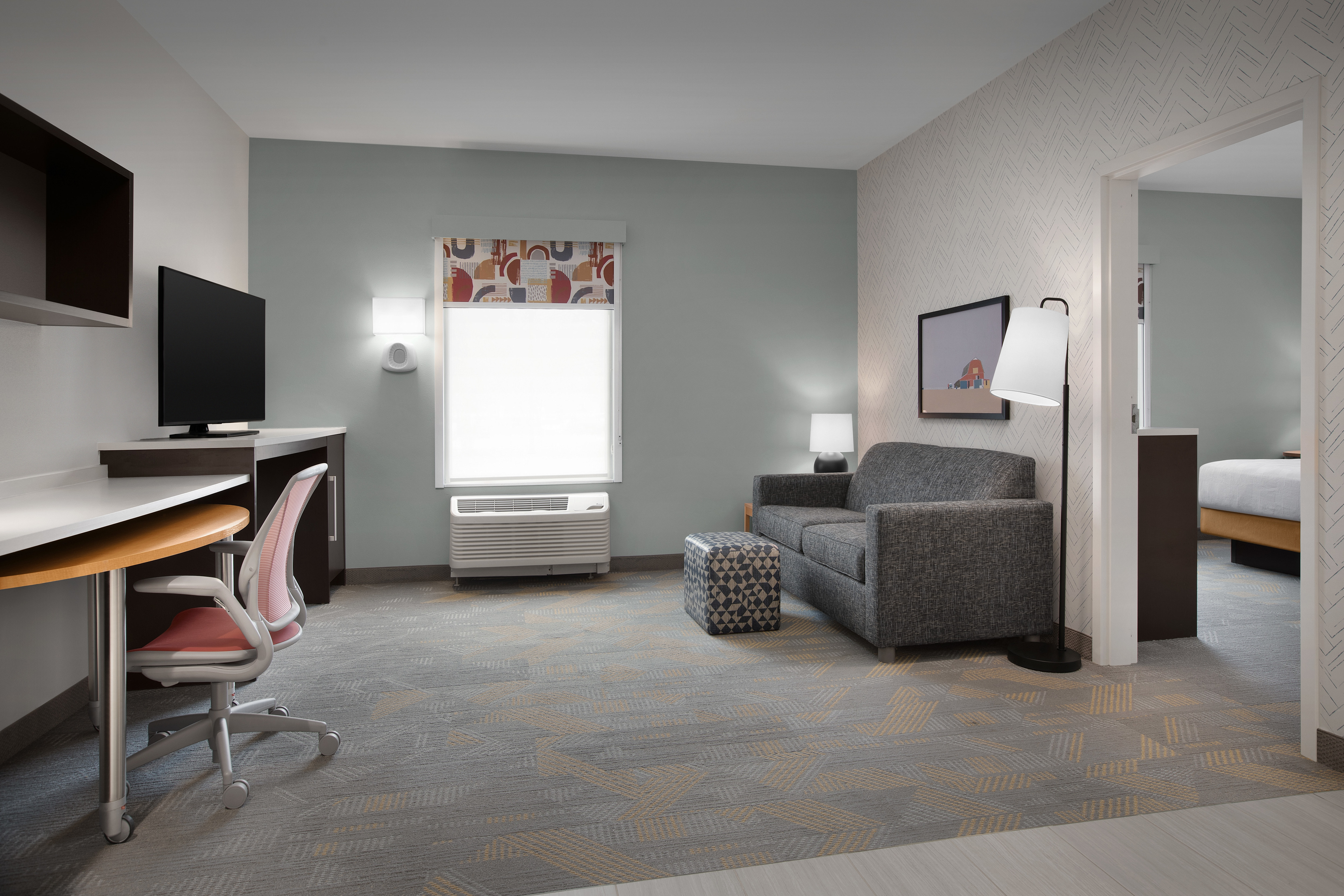 Suite Lounge with Sofa, Work Desk, and TV