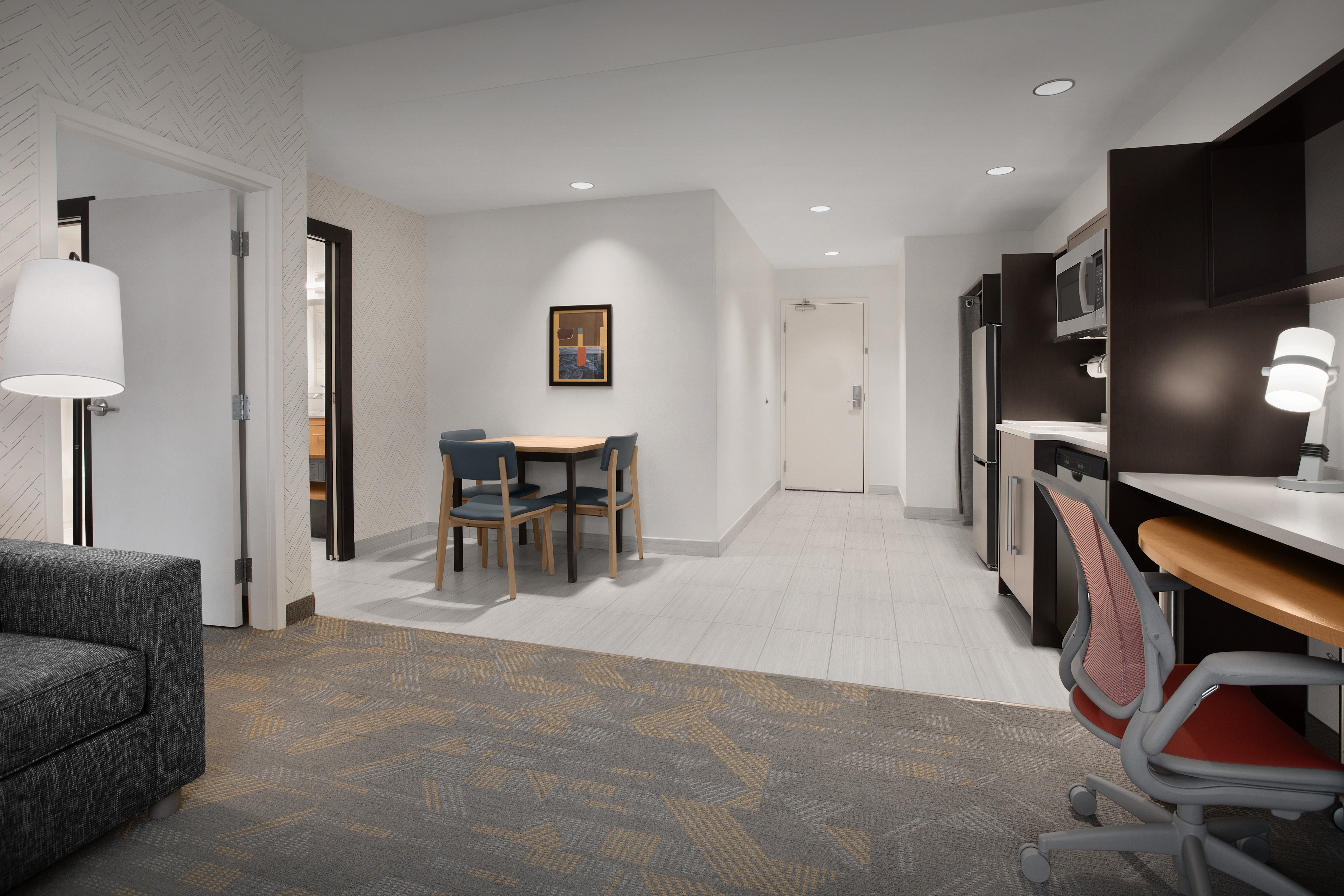 Suite with Work Desk, Small Kitchen, and Dining Table