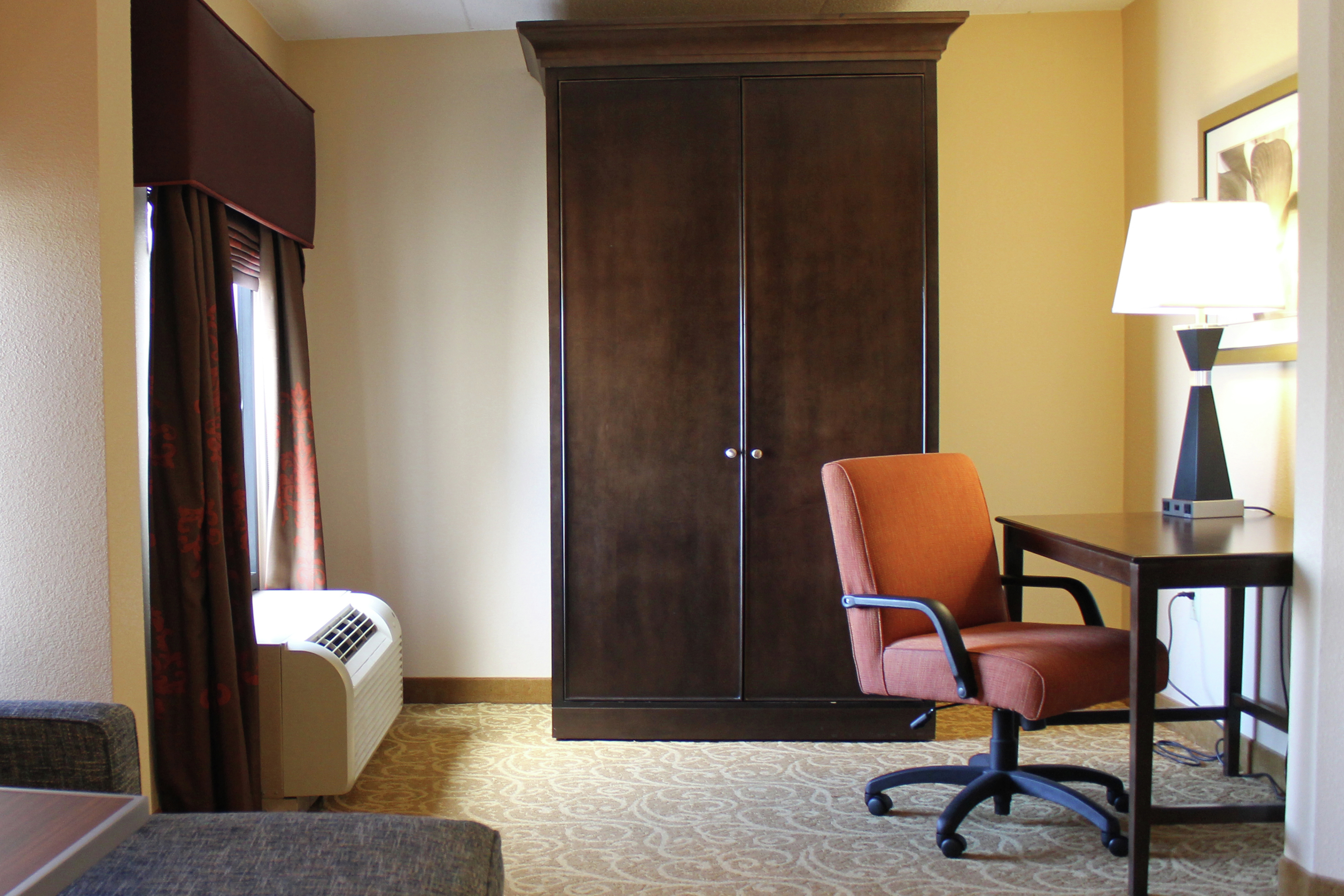 a work desk in a hotel room