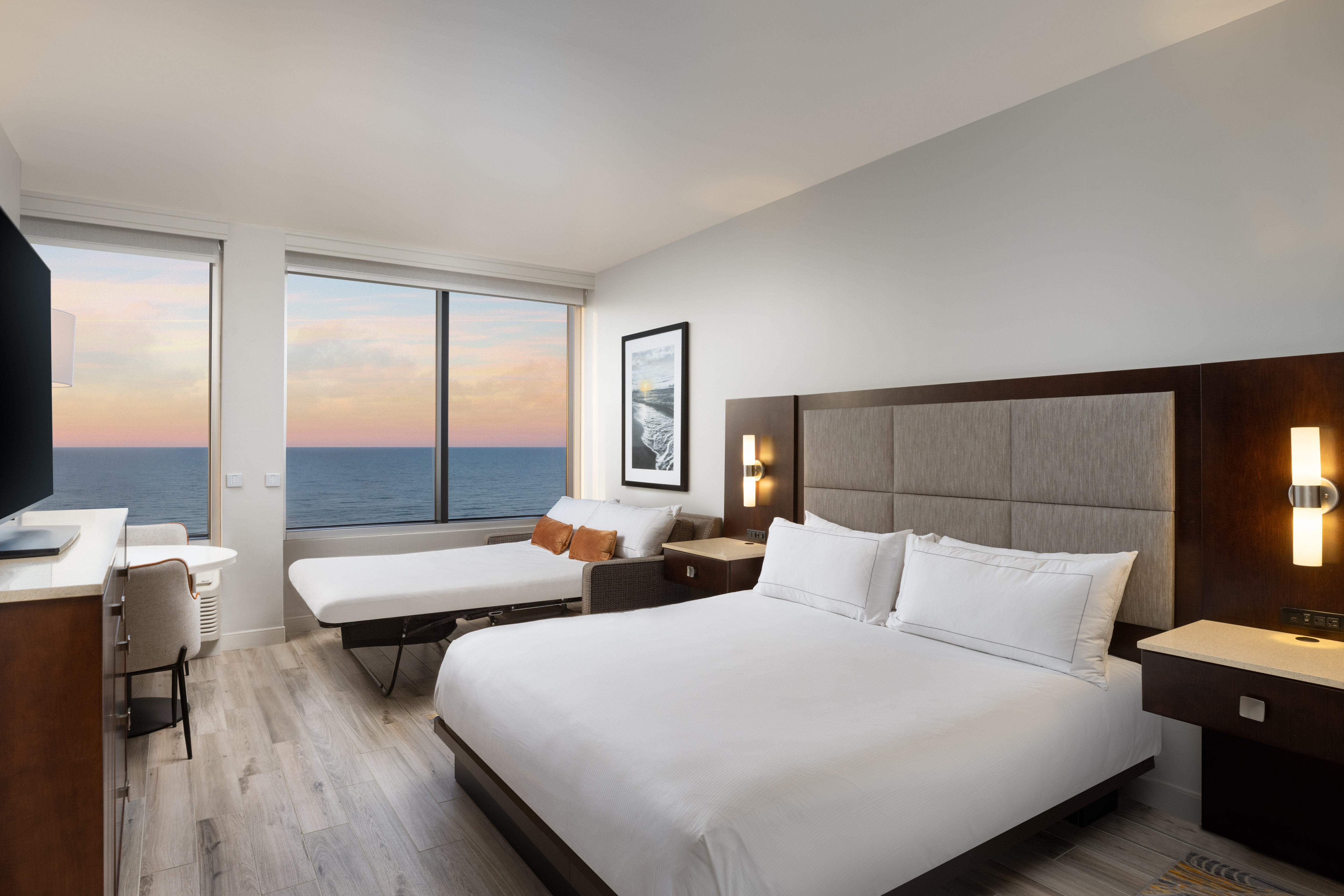 Accessible room with one king bed and sofa bed.