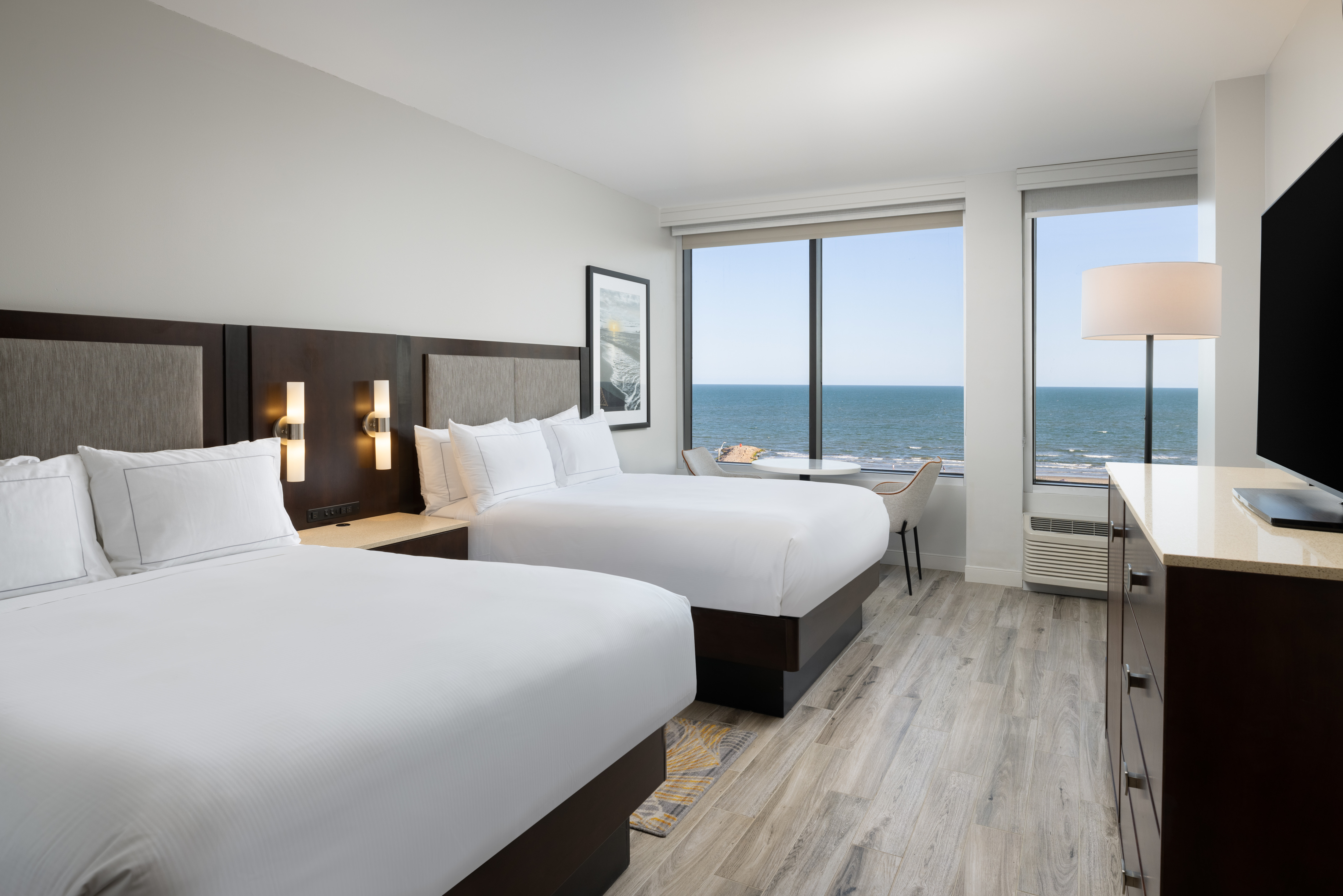 Premium suite with two queen beds and a Gulf view
