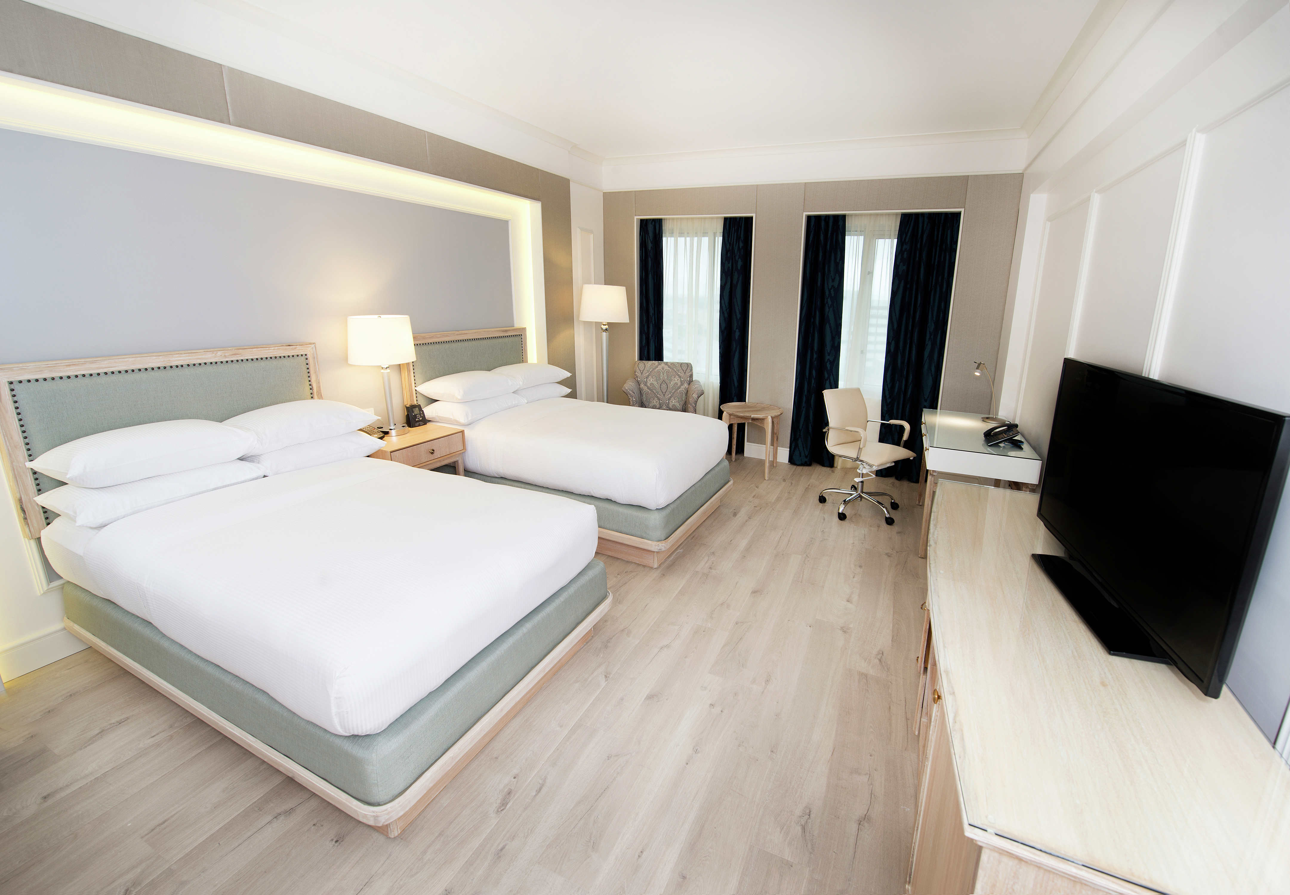 Executive Room with Two Beds Desk and TV