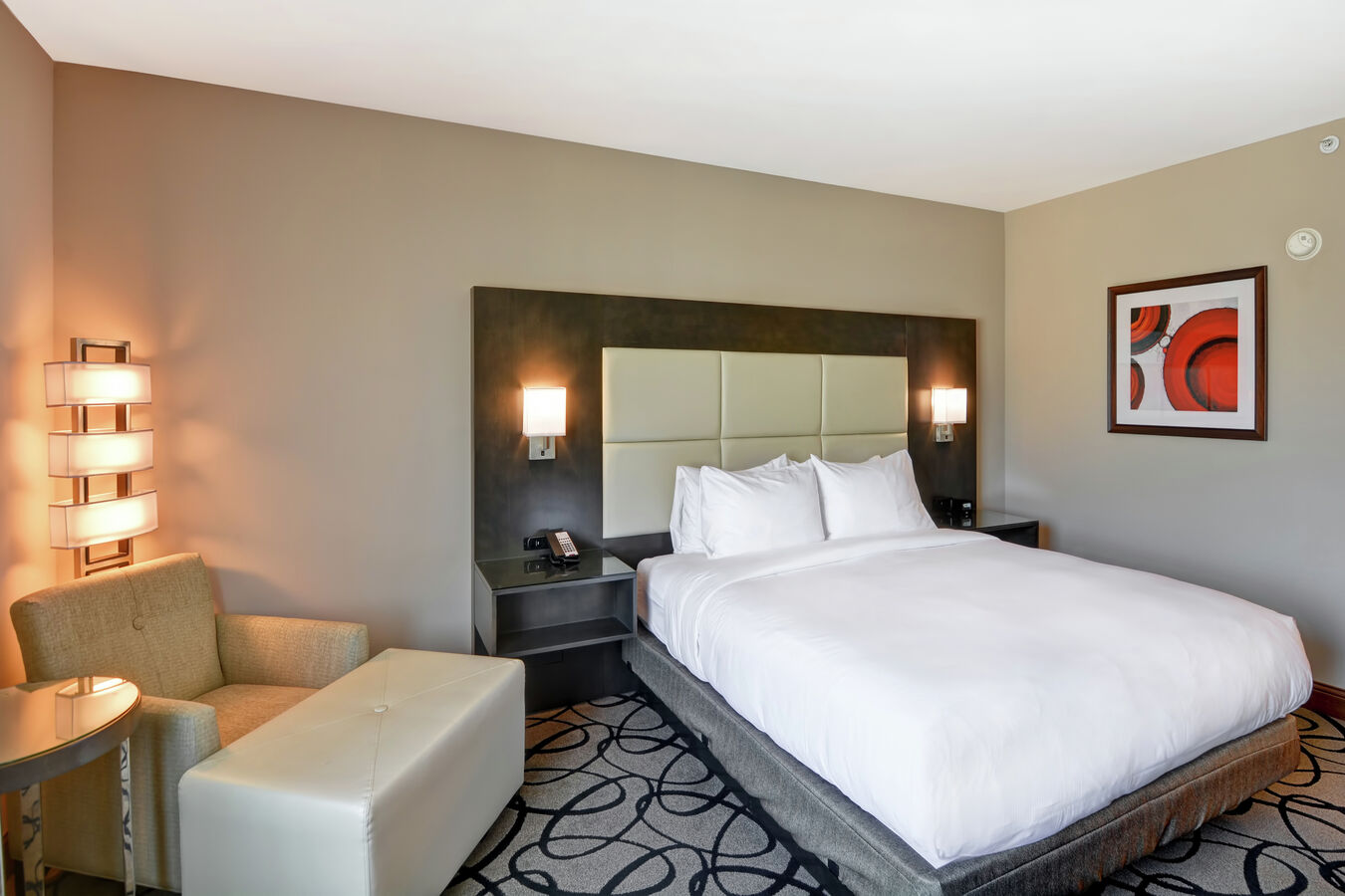 King Bed, Lounge Chair, and Ottoman in Guest Room