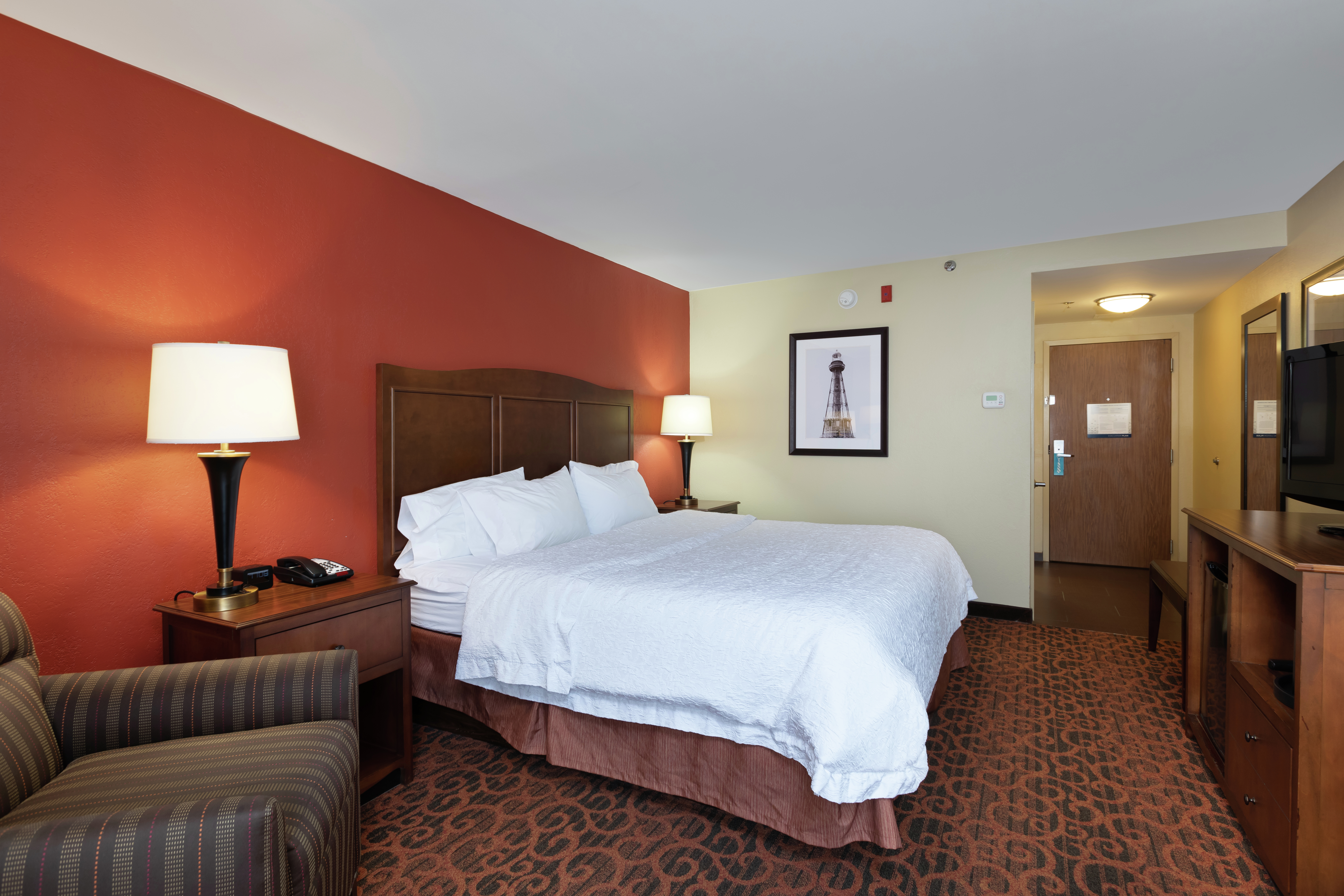 Guest Room with Single King, Chair, and Television