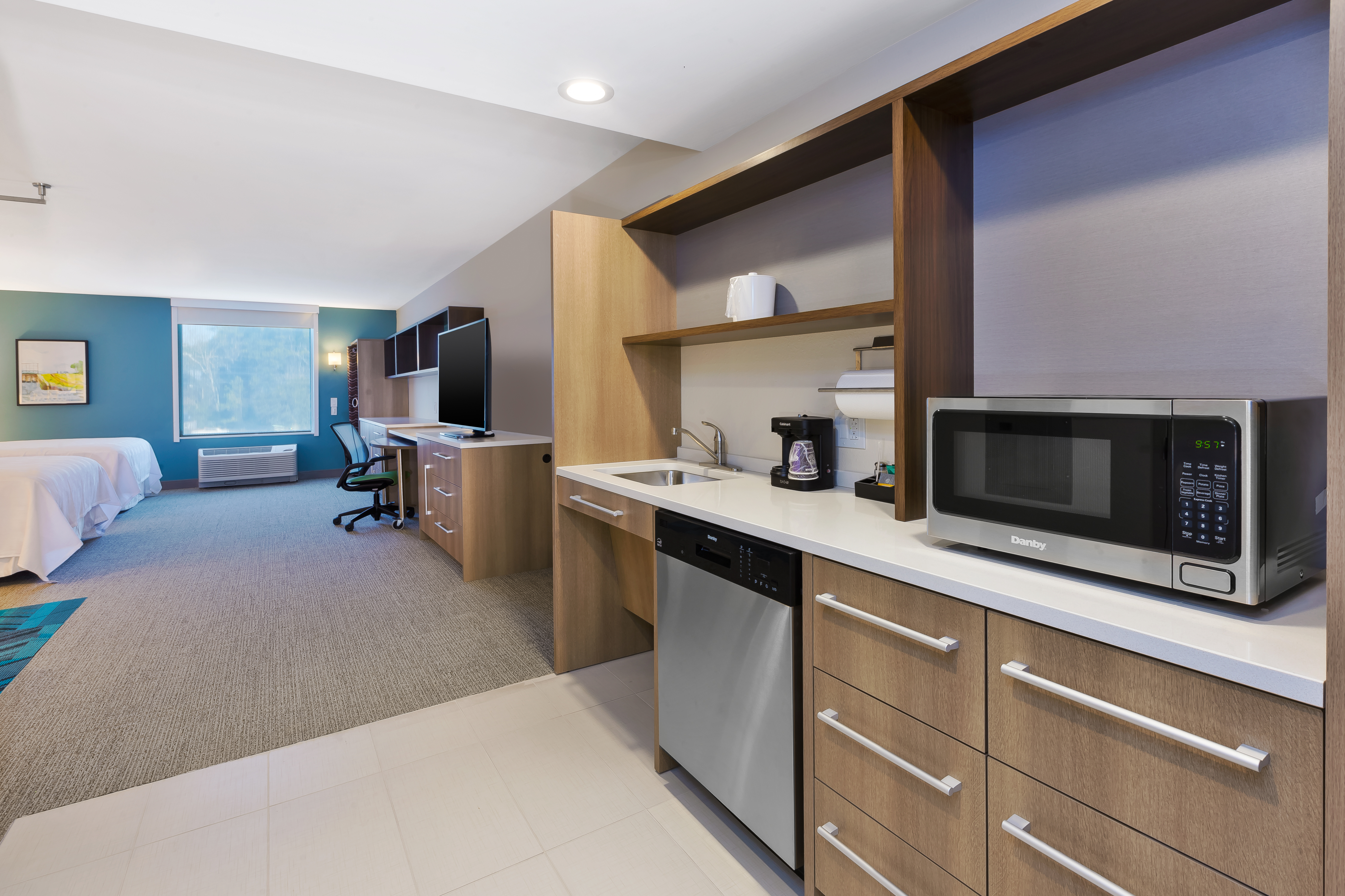 Kitchen with microwave and refrigerator