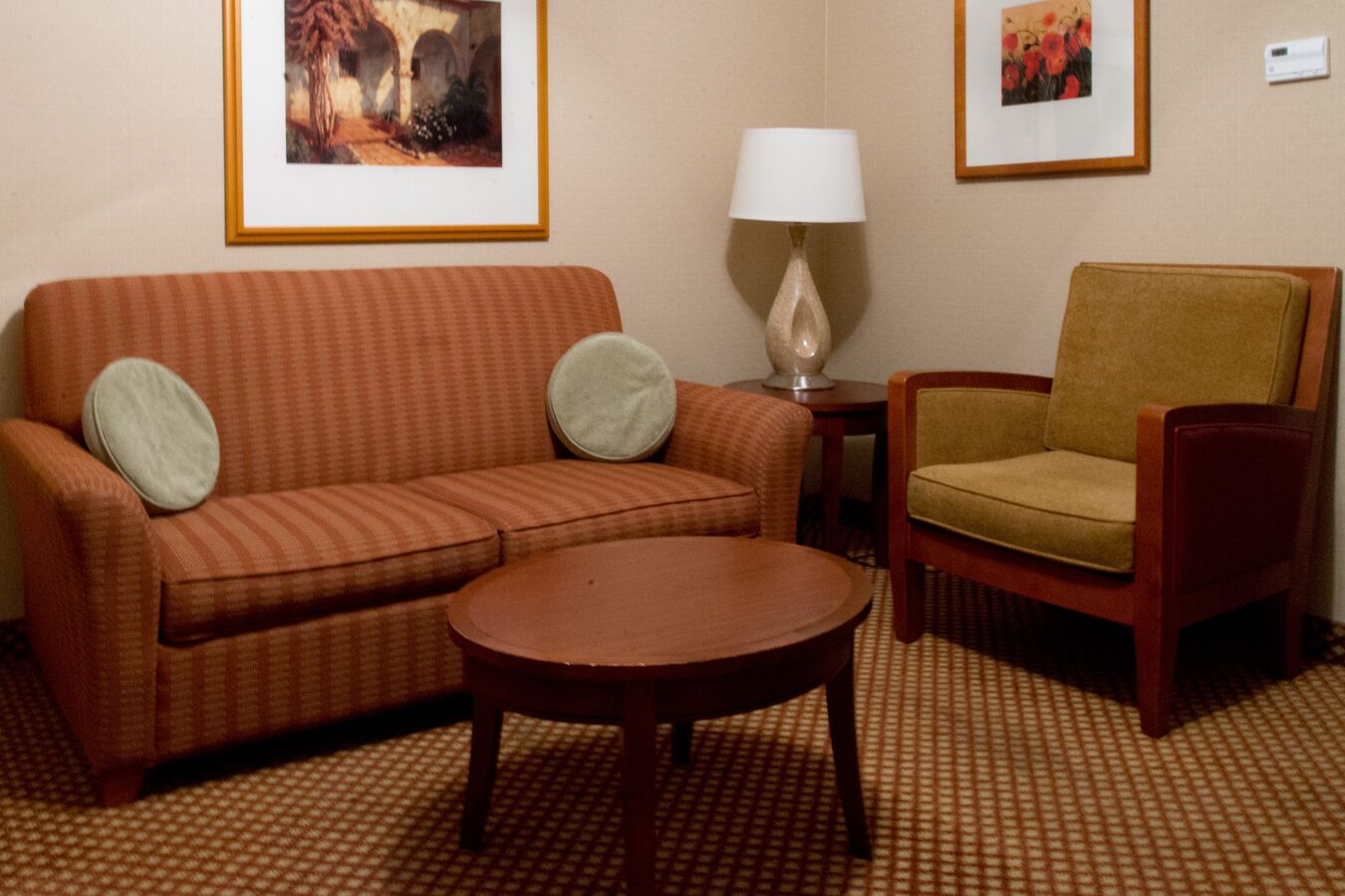 Sofa Bed, Wall Art, Armchair, Tables and Lamp in Junior Suite Living Area