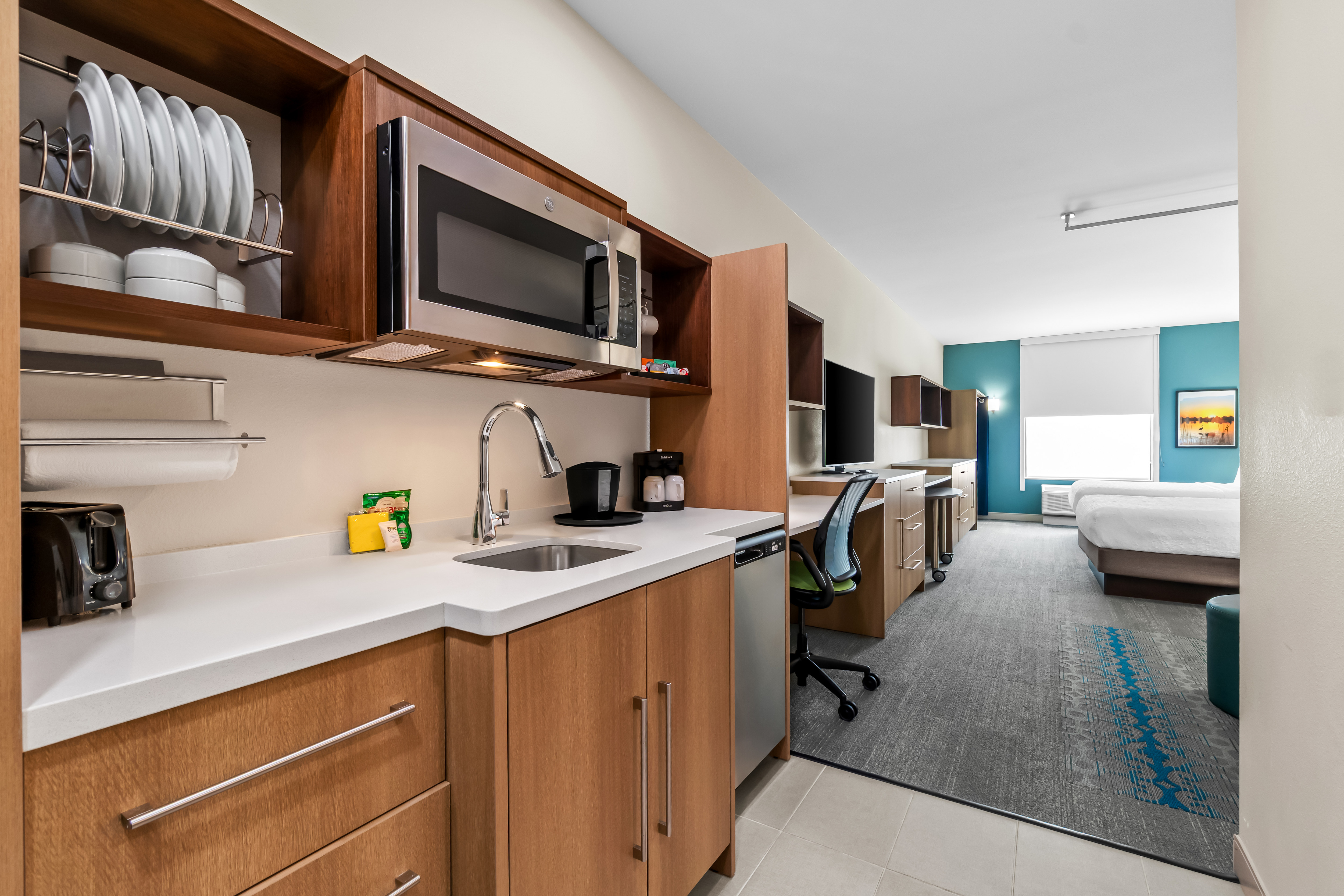 guestroom entry into bedroom with kitchen