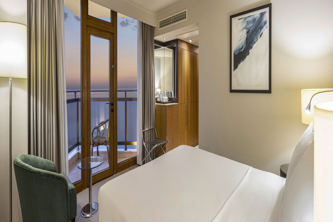king bed with view of balcony