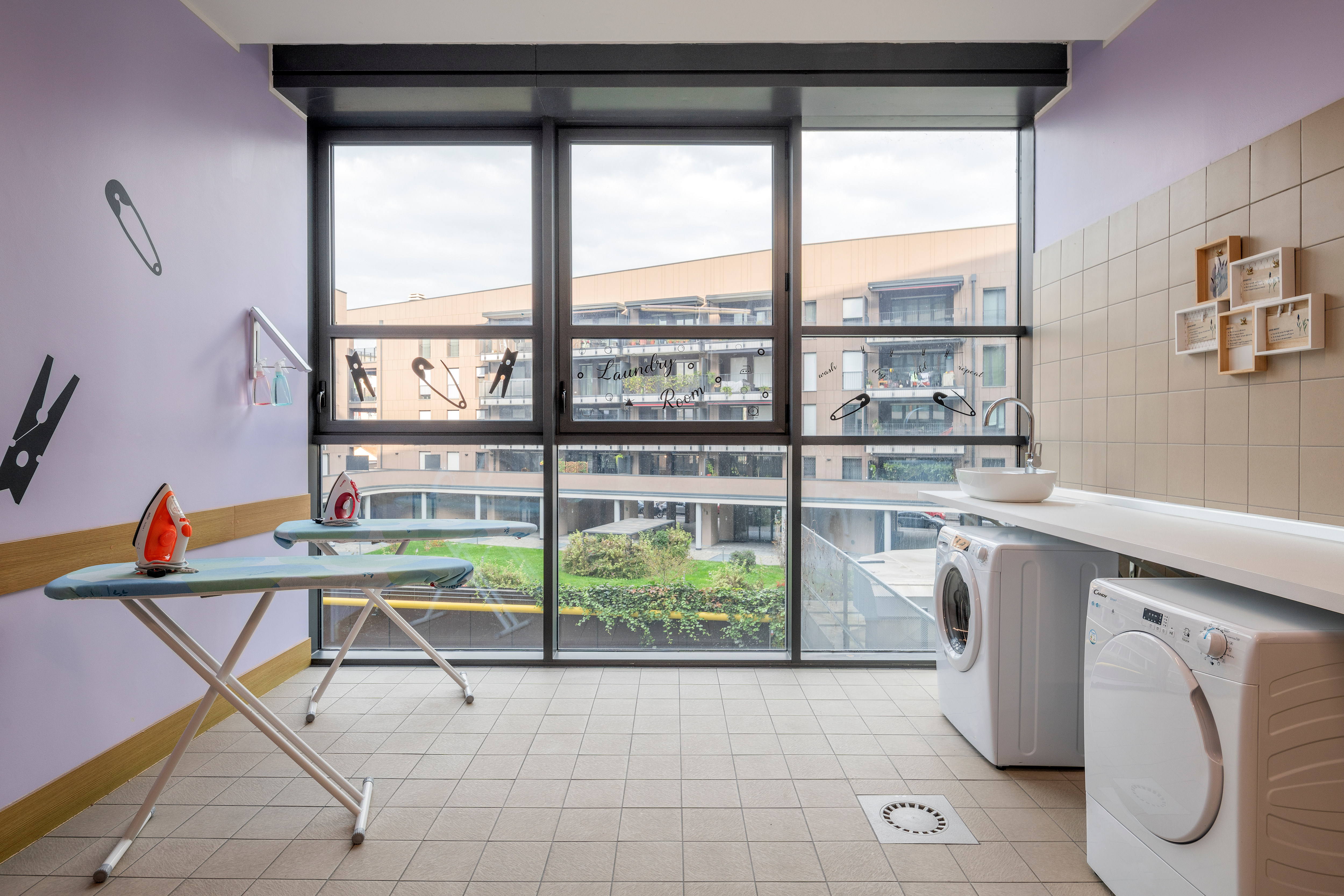 Hotel Laundry Room with Ironing Boards