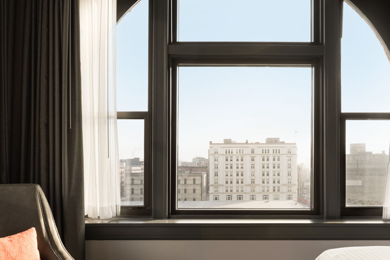 Guestroom with City View from Window